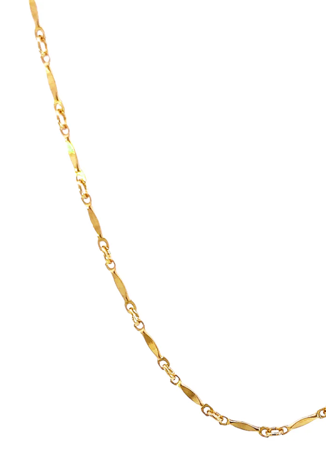 Close-up of a 14k yellow gold filled permanent bracelet with fine chain links, elegantly displayed on a white background.