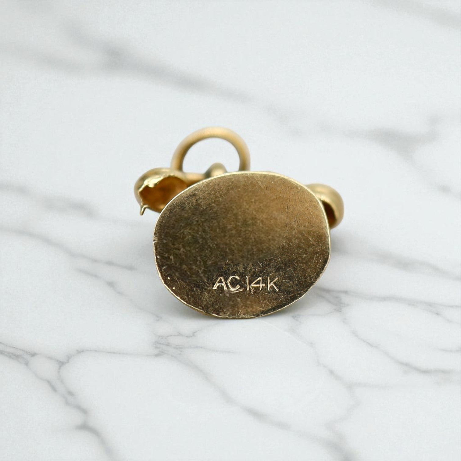 14k gold "I Love You" rotary telephone charm, vintage-style jewelry accessory with detailed design.