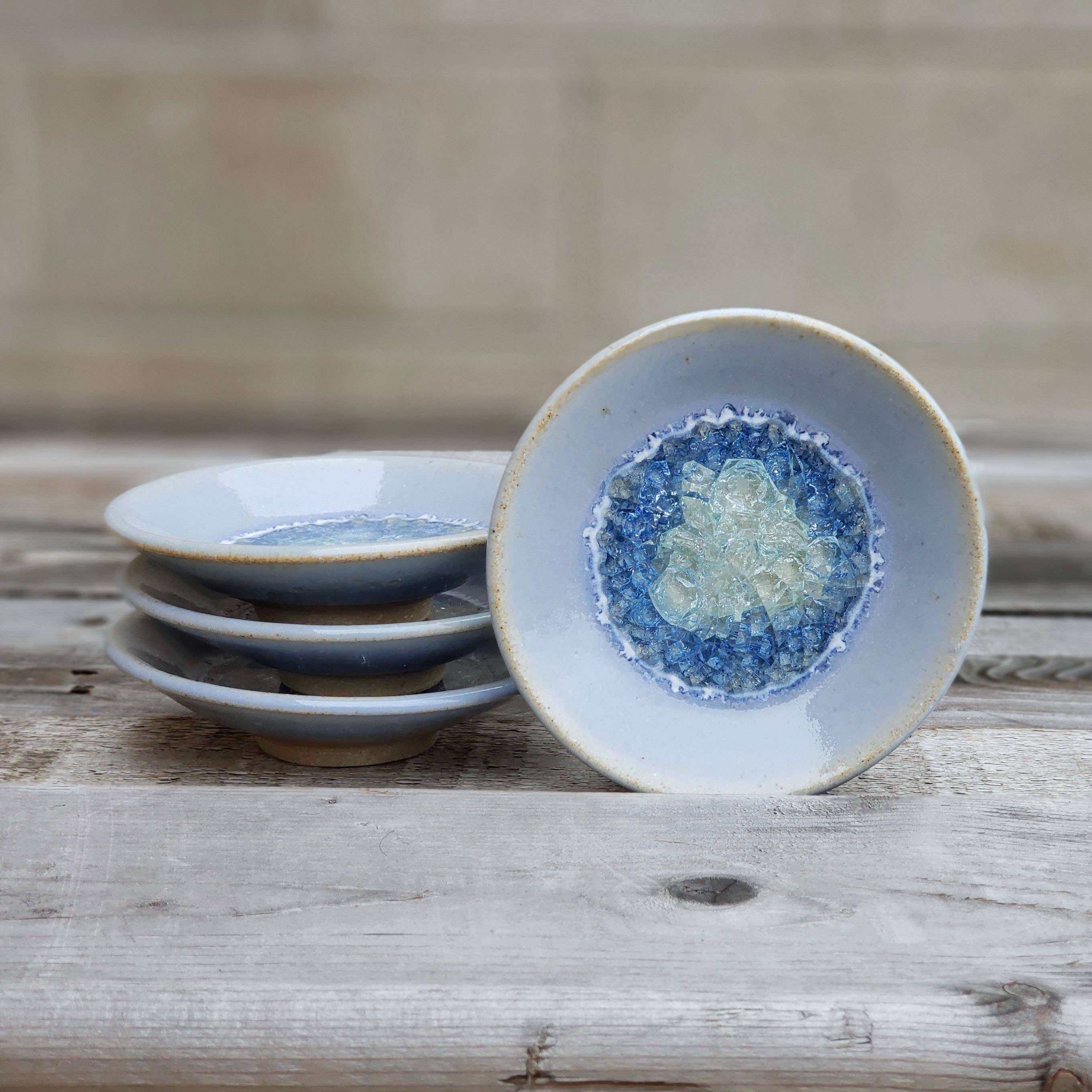 Handmade wasabi-dipping dish by Dock 6 Pottery, custom-made ceramic bowl with a unique glaze and rounded shape.