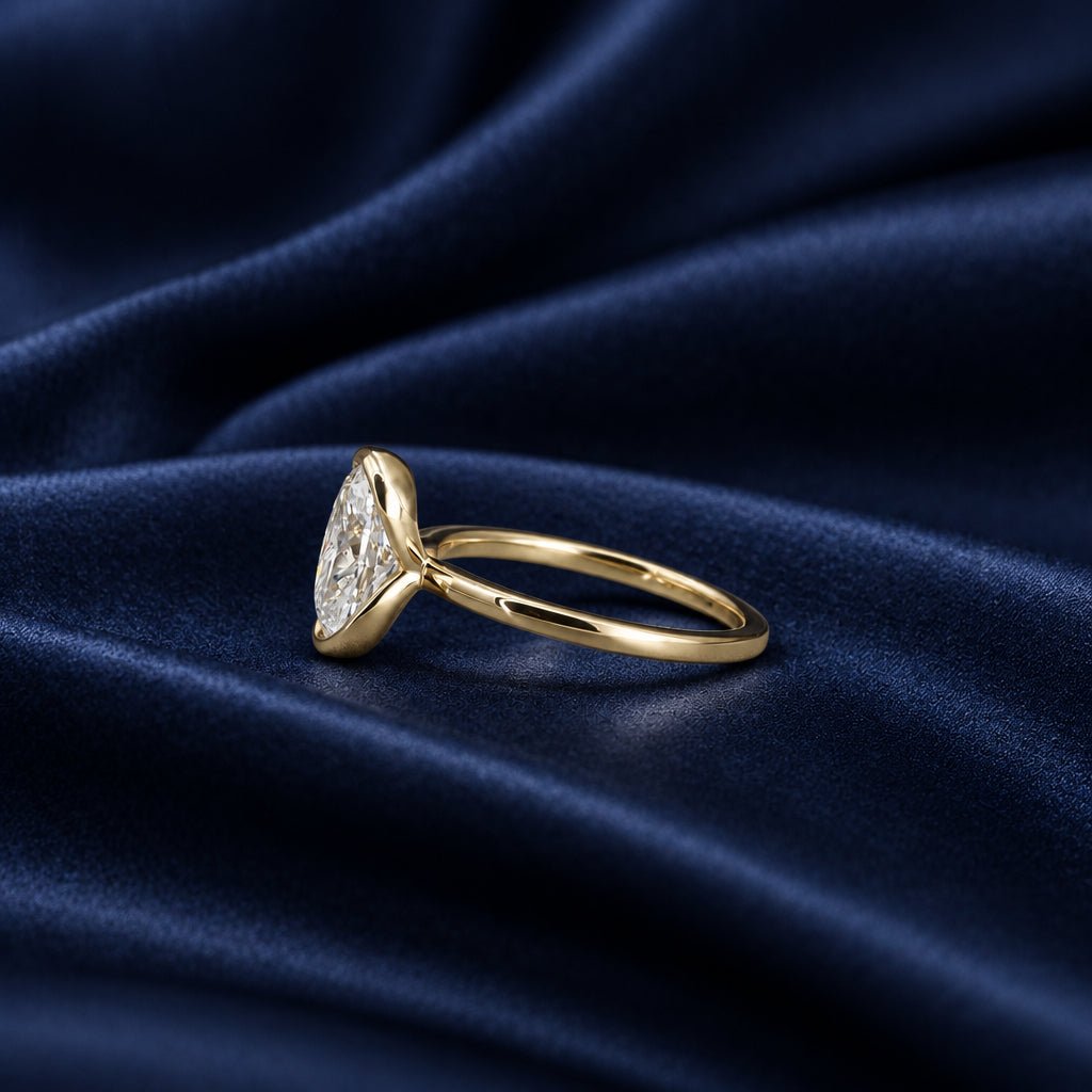 2.01 ct Oval Lab-Grown Diamond Solitaire Engagement Ring in 14k Yellow Gold, Partial Bezel, IGI, Size 7 - Petra StarEngagement Ring
