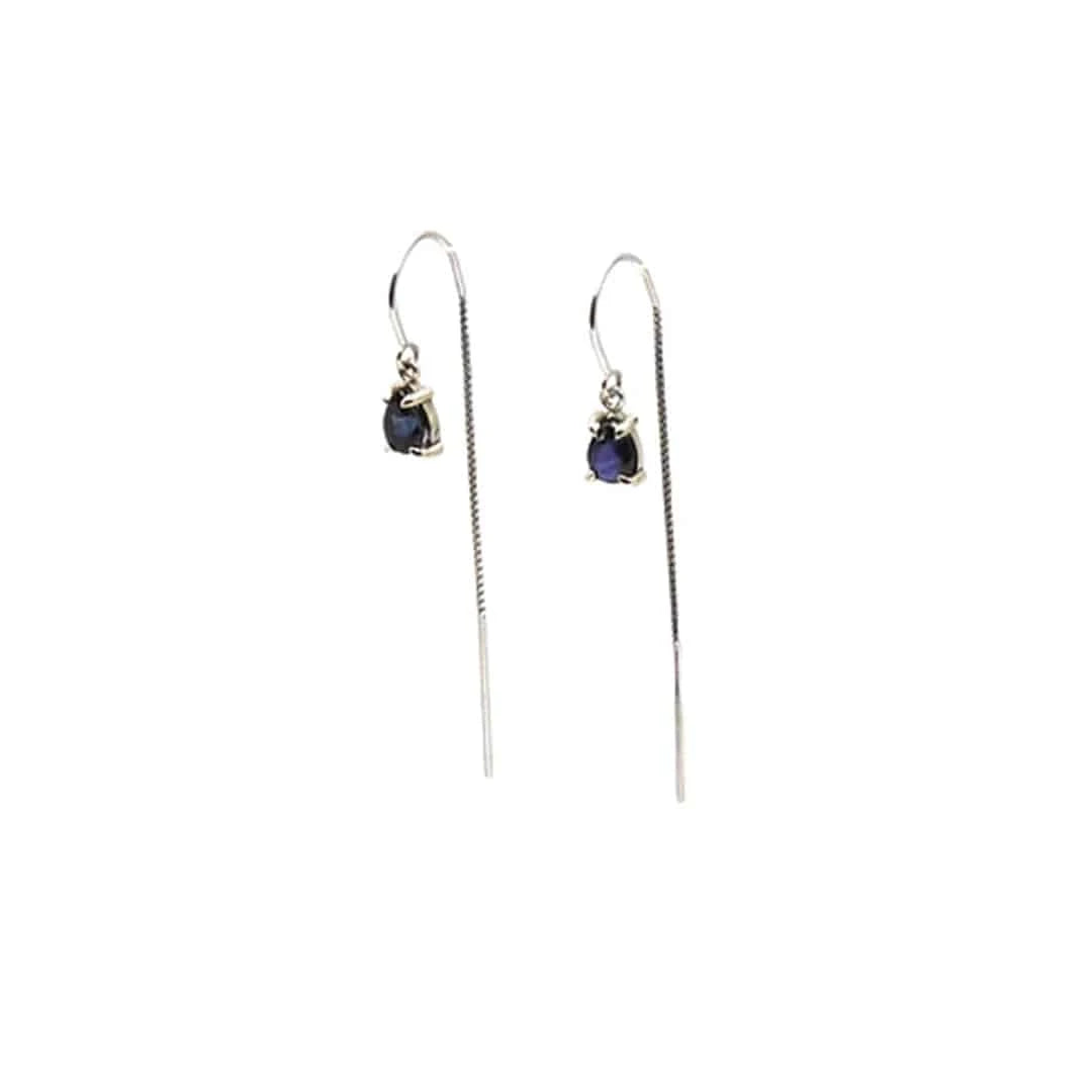 Petra Star sapphire threader earrings in 14k white gold featuring deep blue sapphires on delicate, sleek earrings.