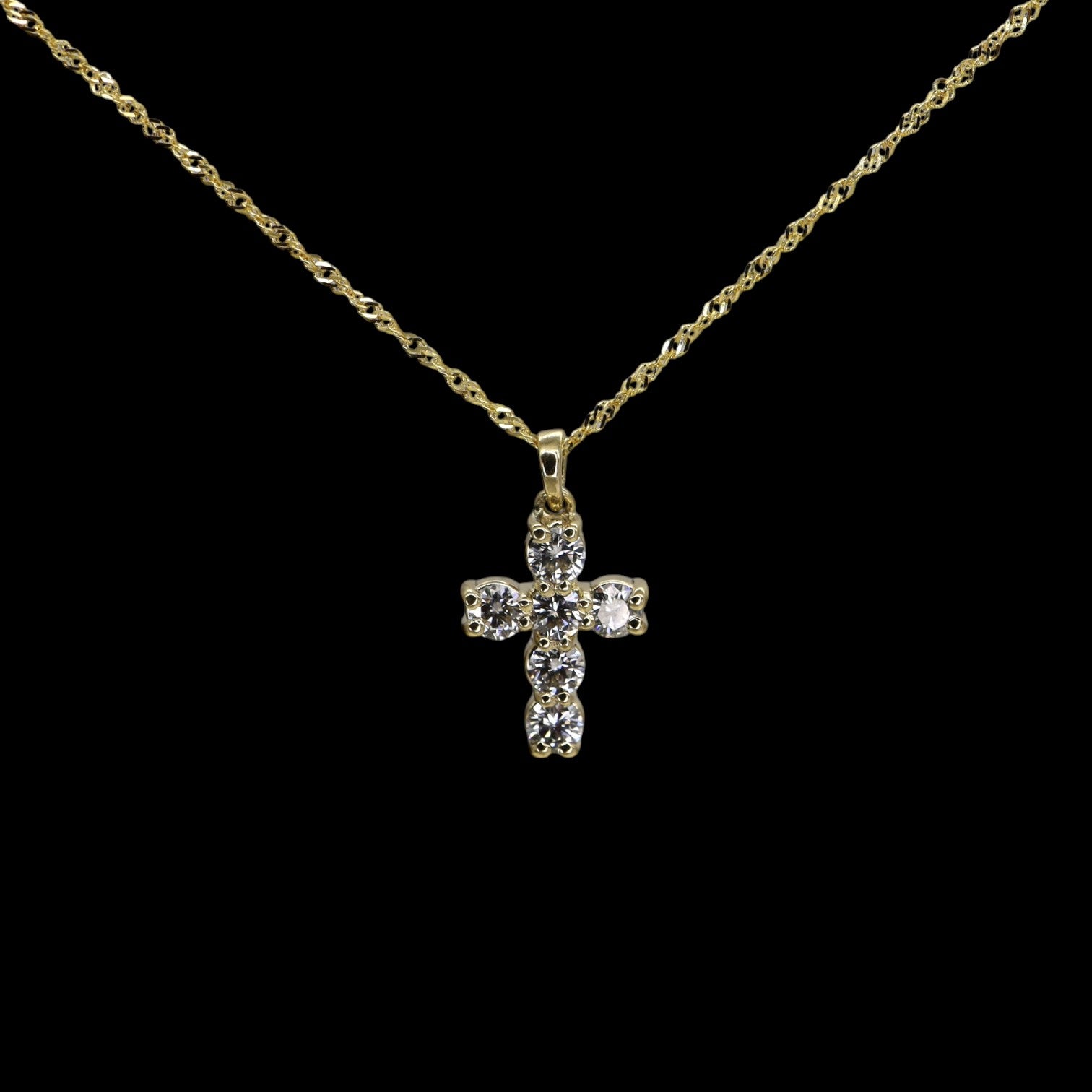 Reclaimed diamond cross pendant in 14k gold with 0.74 carat round brilliant diamonds from Petra Star.