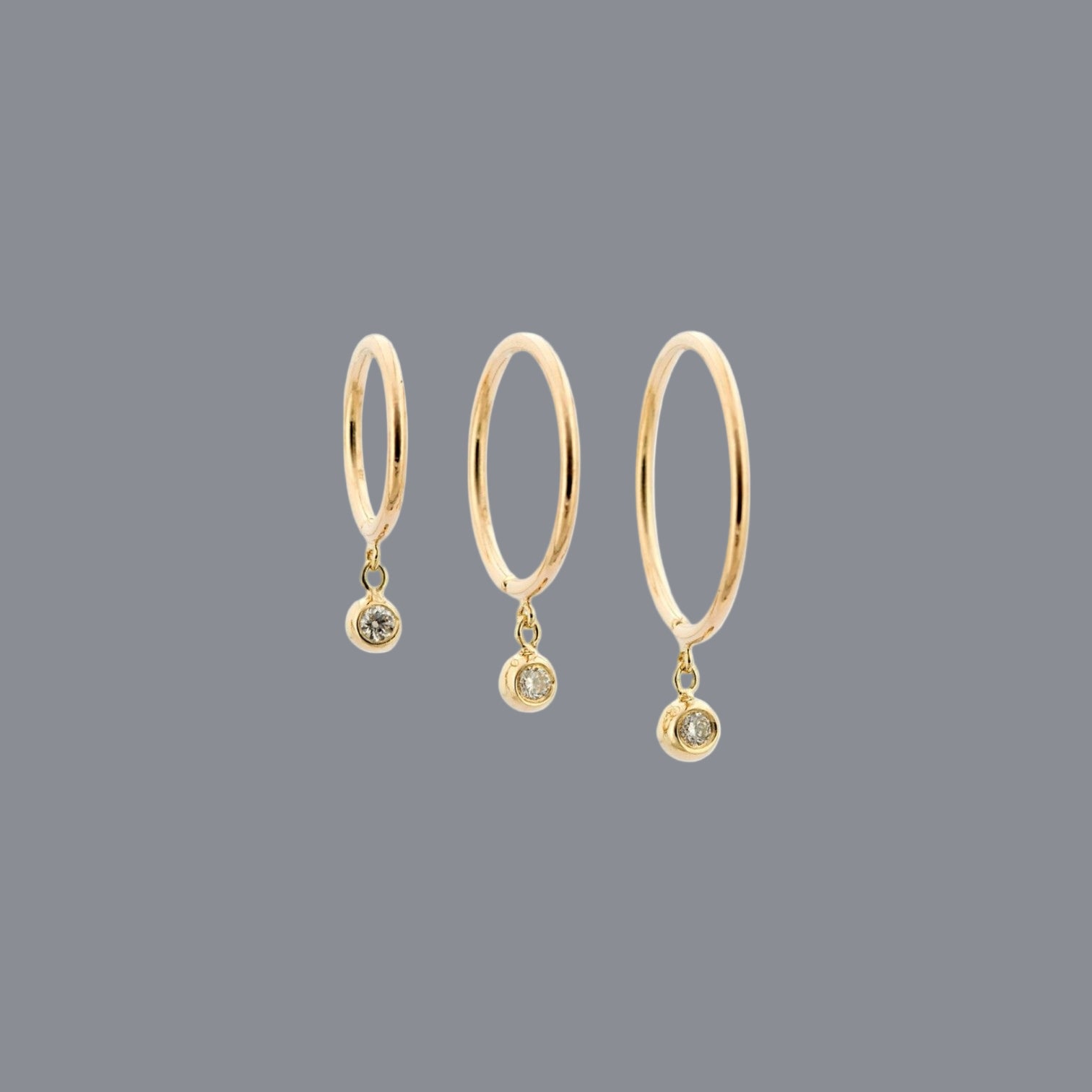 Diamond Droplet Huggie Earrings in 14k Yellow Gold - Petra Star