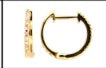 Diamond huggie earring in 14k gold by Dilamani, featuring sparkling diamonds and a comfortable hoop design.