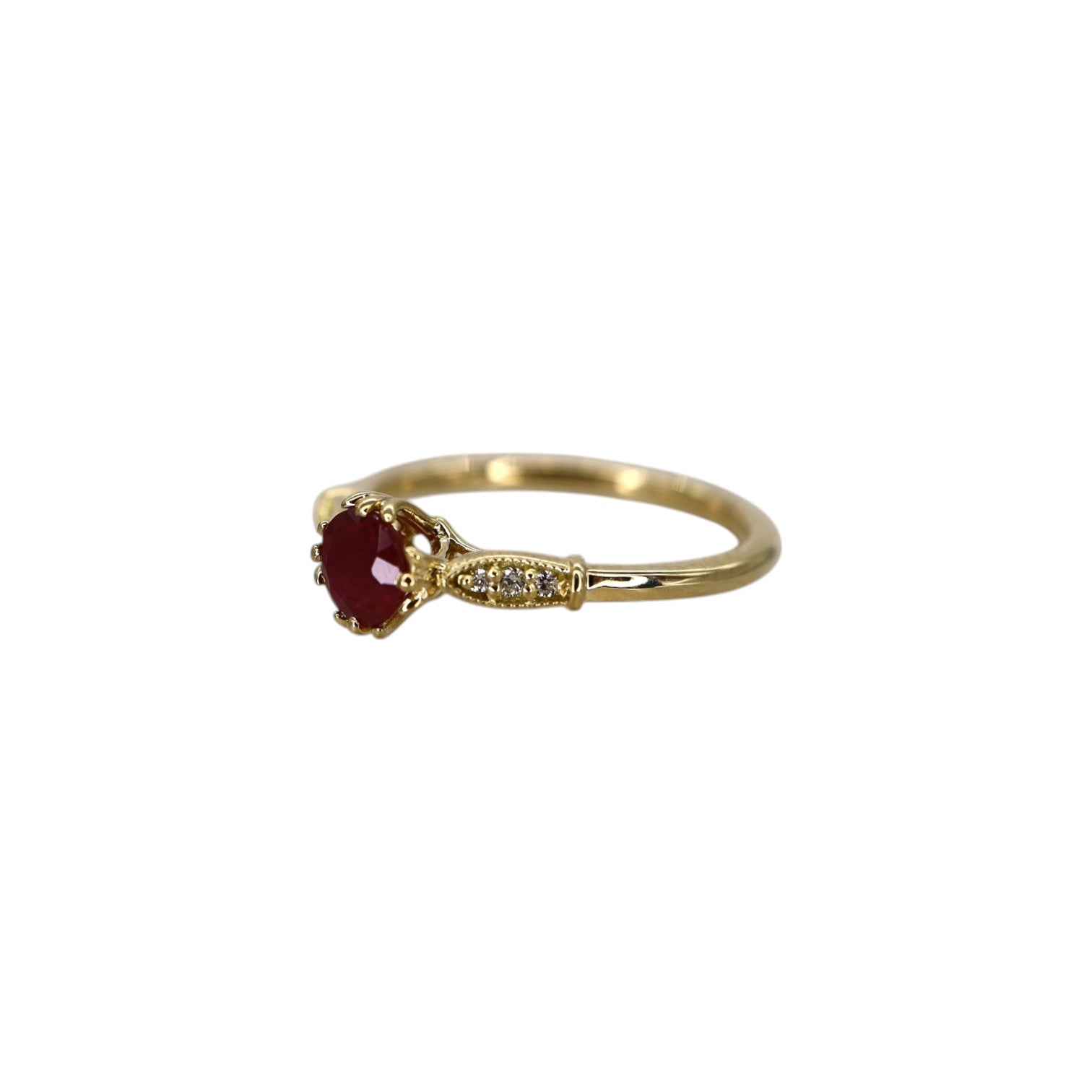 Vintage-inspired cathedral ring with ruby and diamond accents, crafted by The Vintage Vault, featuring intricate metalwork and gemstone details.