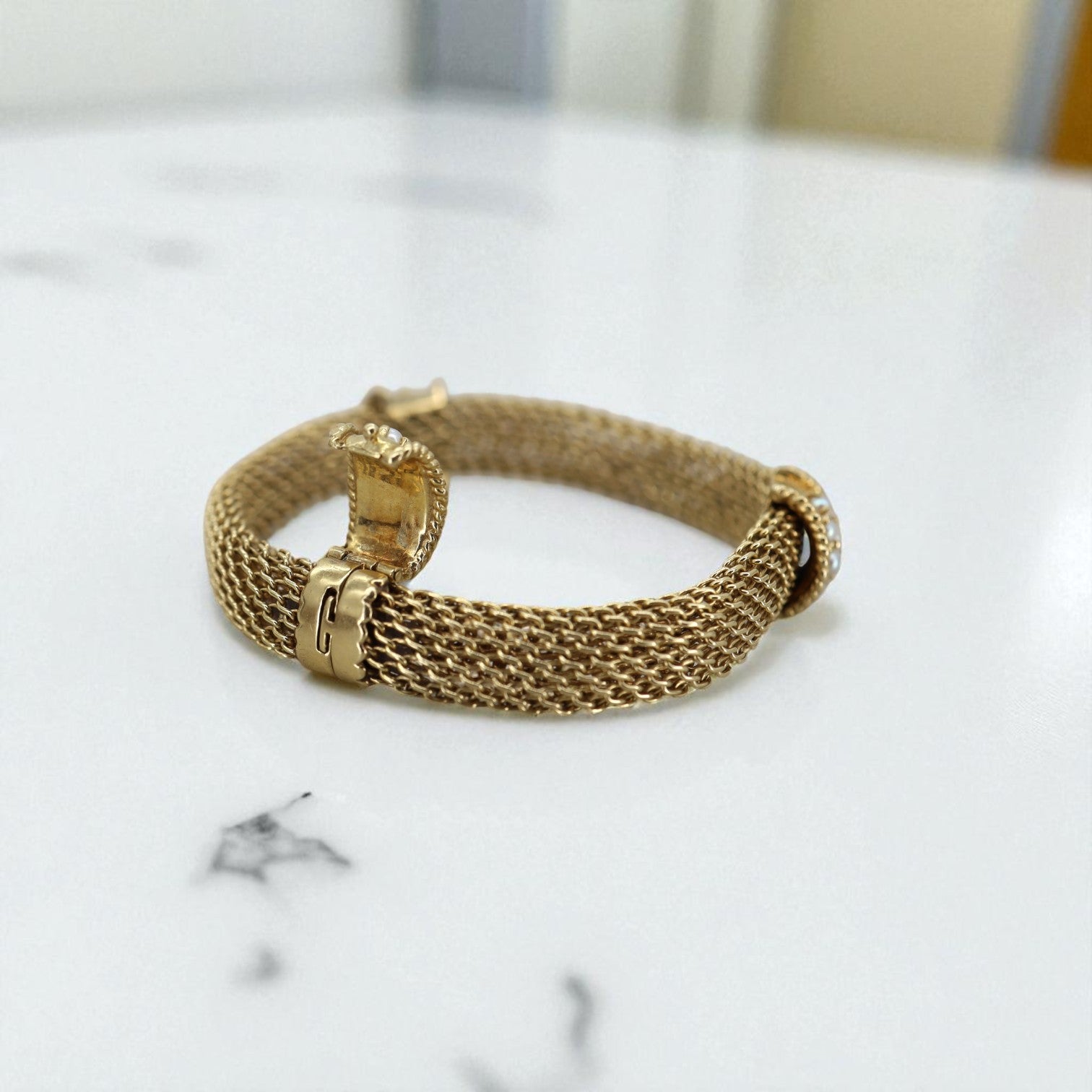 Vintage 14k gold mesh weave bracelet with hidden clasp, stylish jewelry piece from The Vintage Vault.