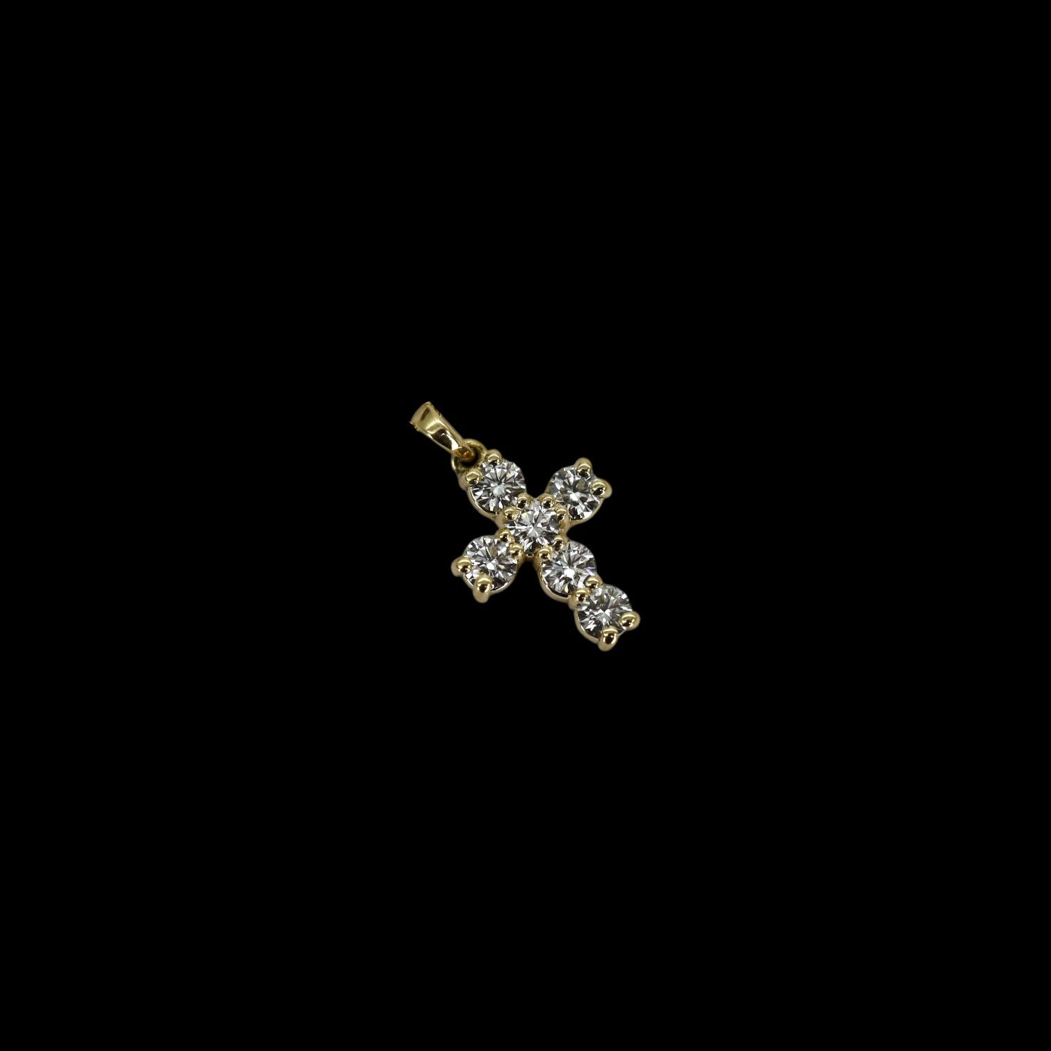 Reclaimed diamond cross pendant in 14k gold with 0.74 CTW round brilliant diamonds by Petra Star, showcasing detailed craftsmanship.