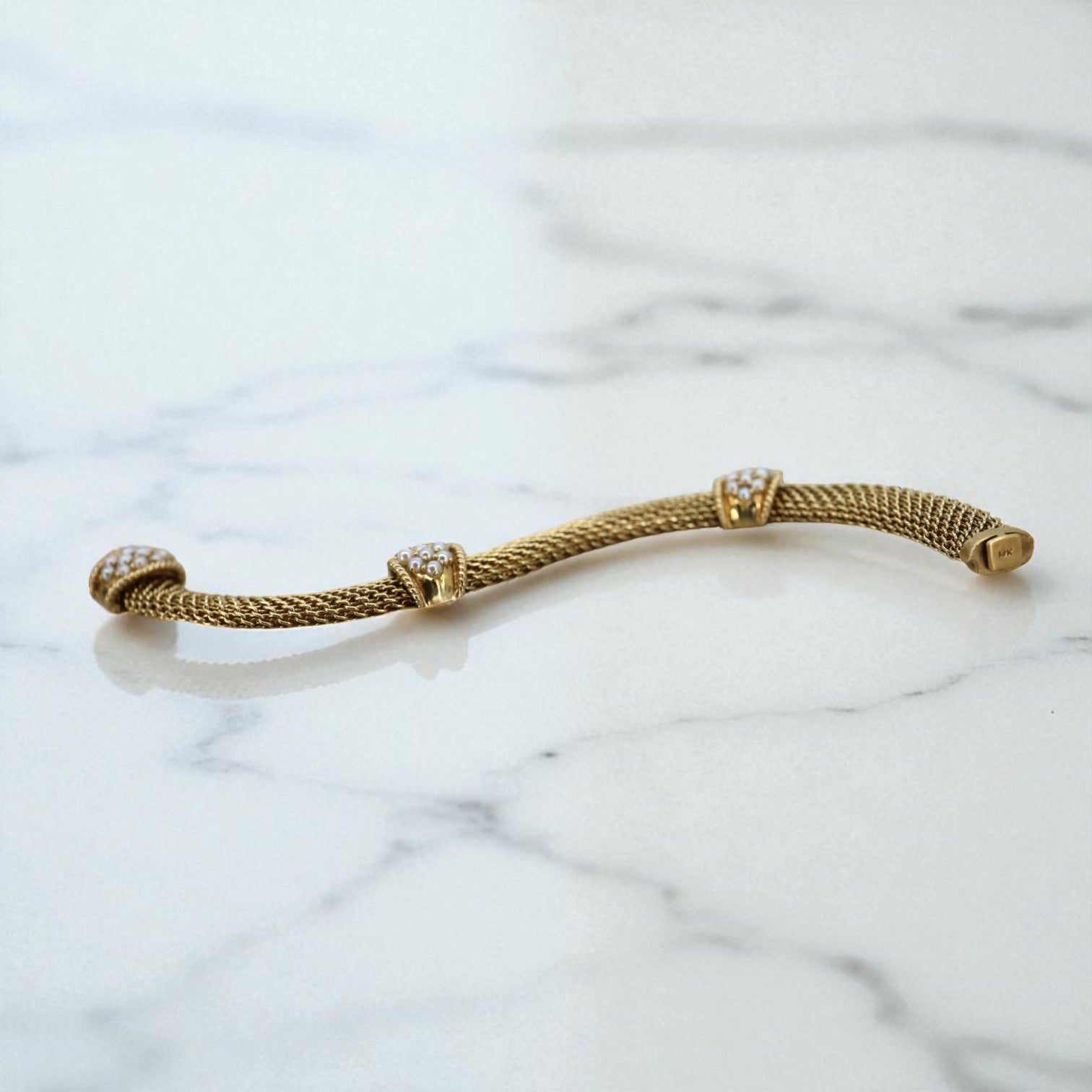 Vintage 14k gold mesh weave bracelet from The Vintage Vault, featuring a delicate, intricate design and fine craftsmanship.