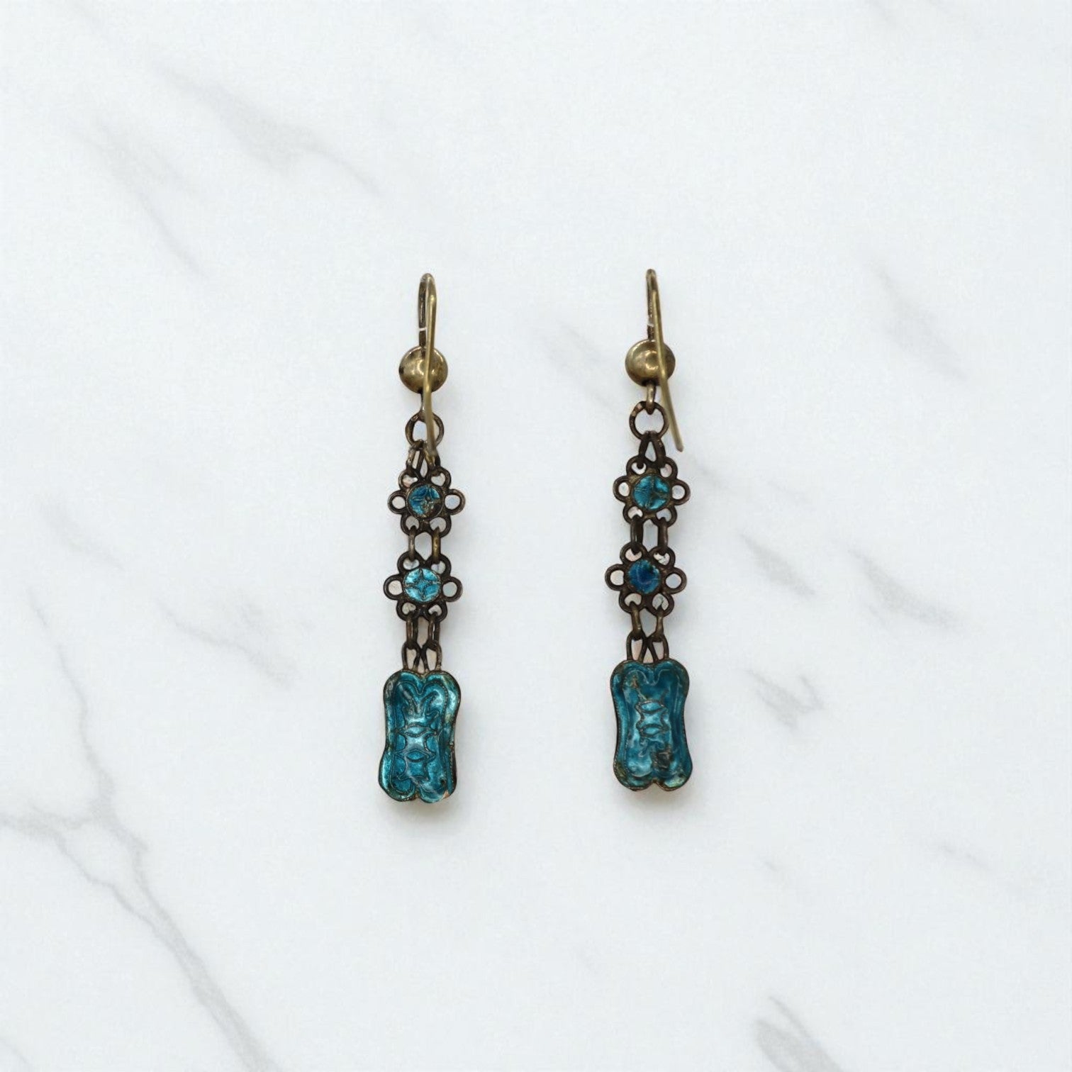 Art Nouveau Guilloche enamel earrings featuring intricate patterns and vibrant colors, crafted by The Vintage Vault.