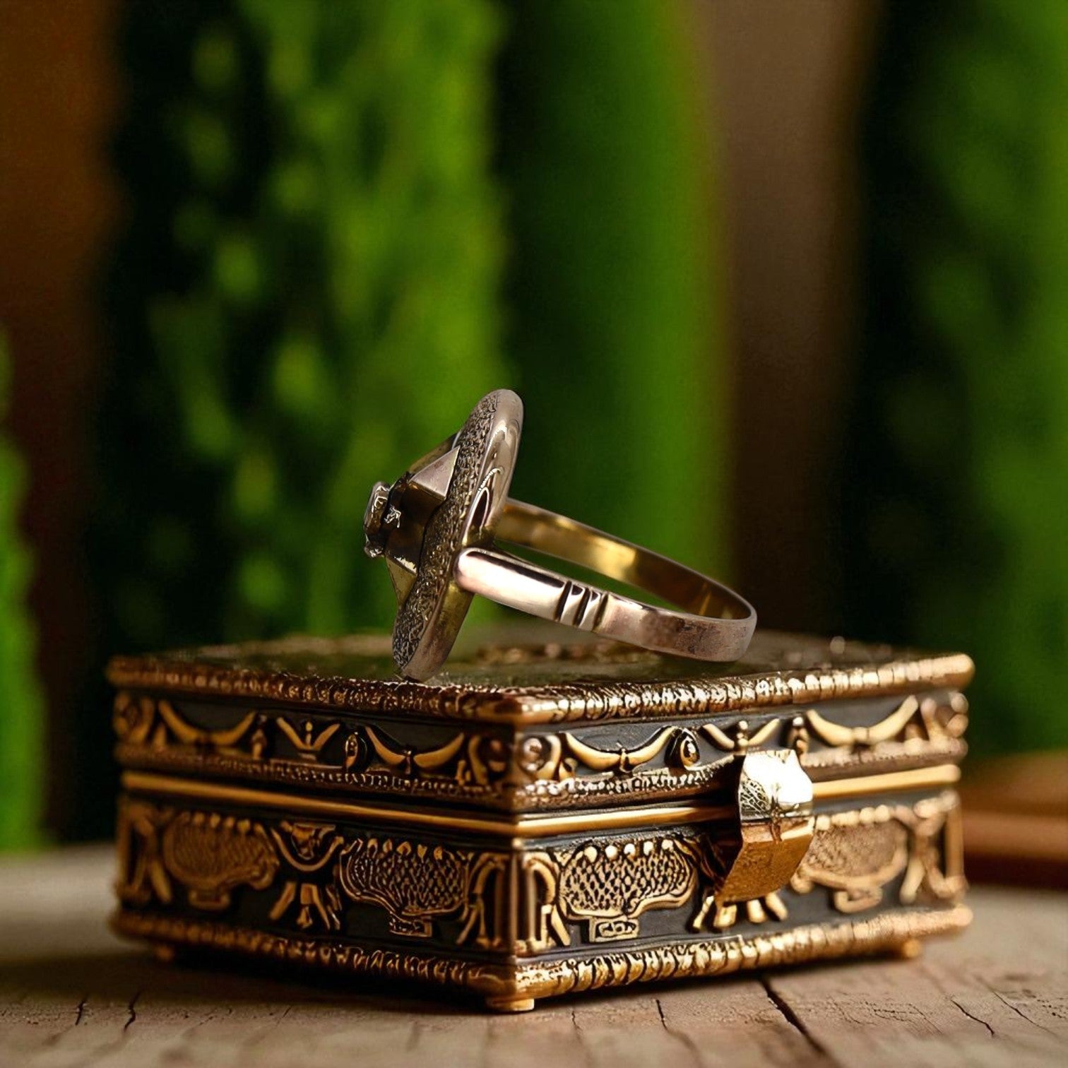 Victorian turquoise ring from The Vintage Vault featuring a detailed ornate design and a central turquoise gemstone.