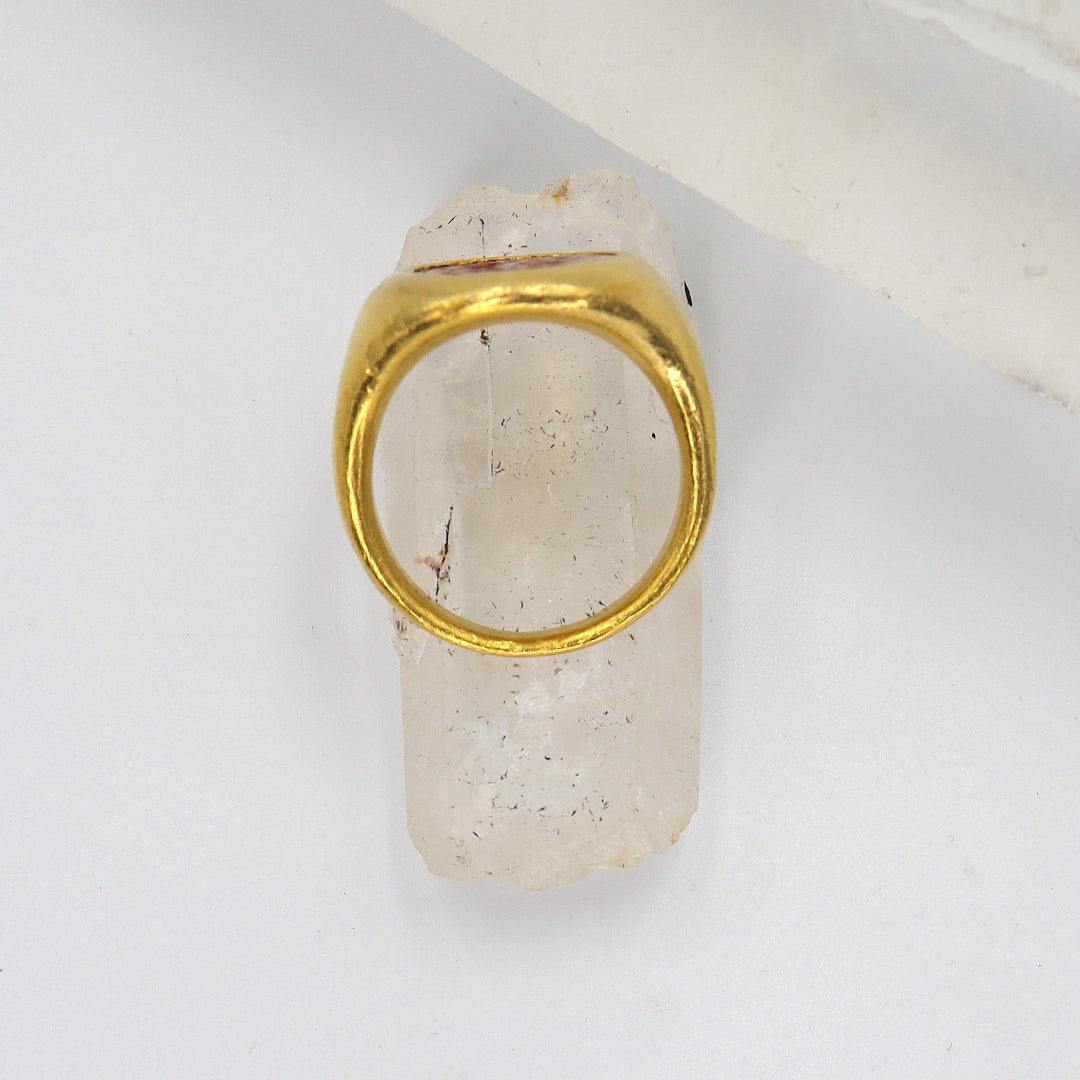 Antique Carnelian Intaglio ring in 22k gold featuring intricate carved gemstone design, vintage jewelry piece.