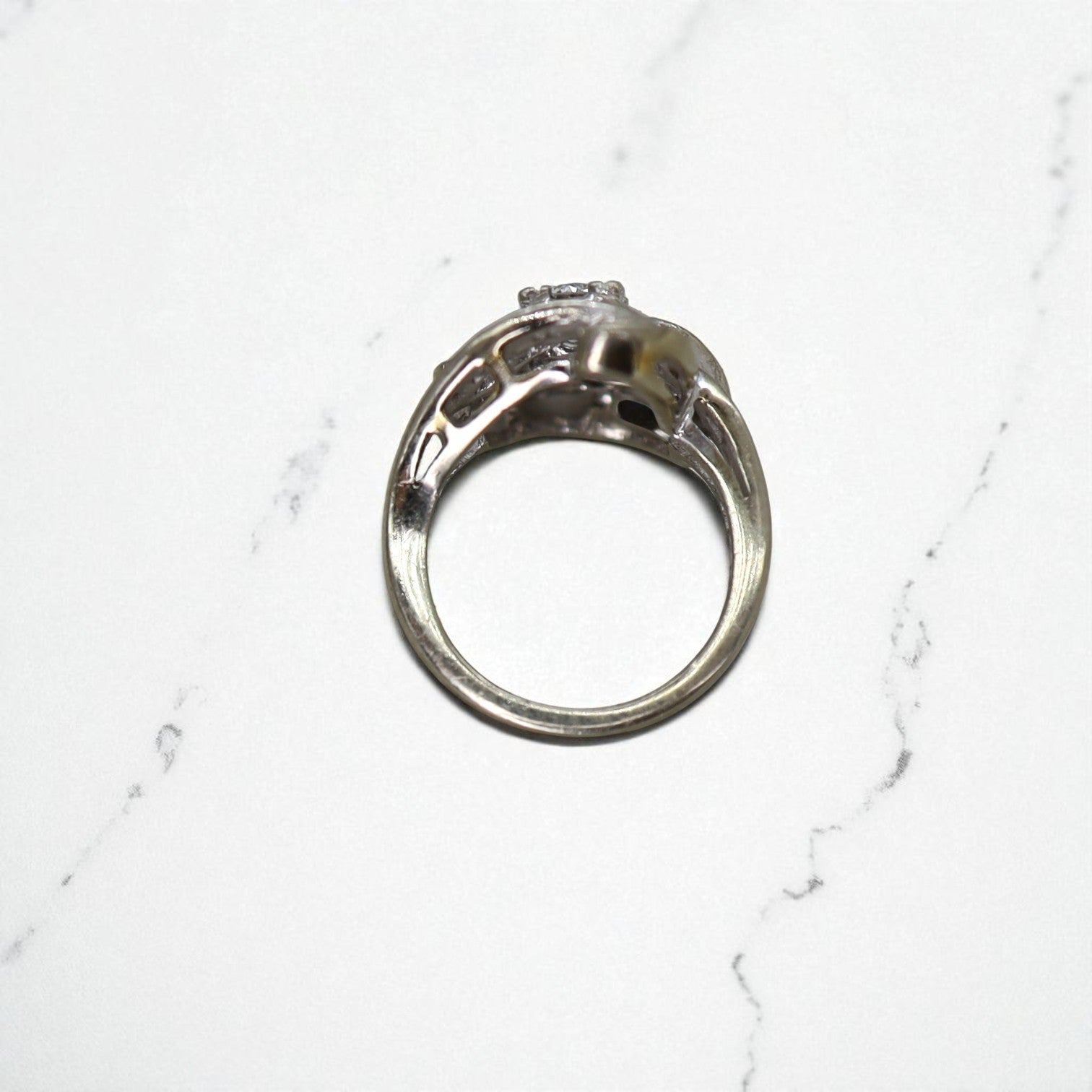 Vintage Diamond Retro Cocktail Ring in 14k white gold with a cluster design, featuring sparkling diamonds and intricate detailing.