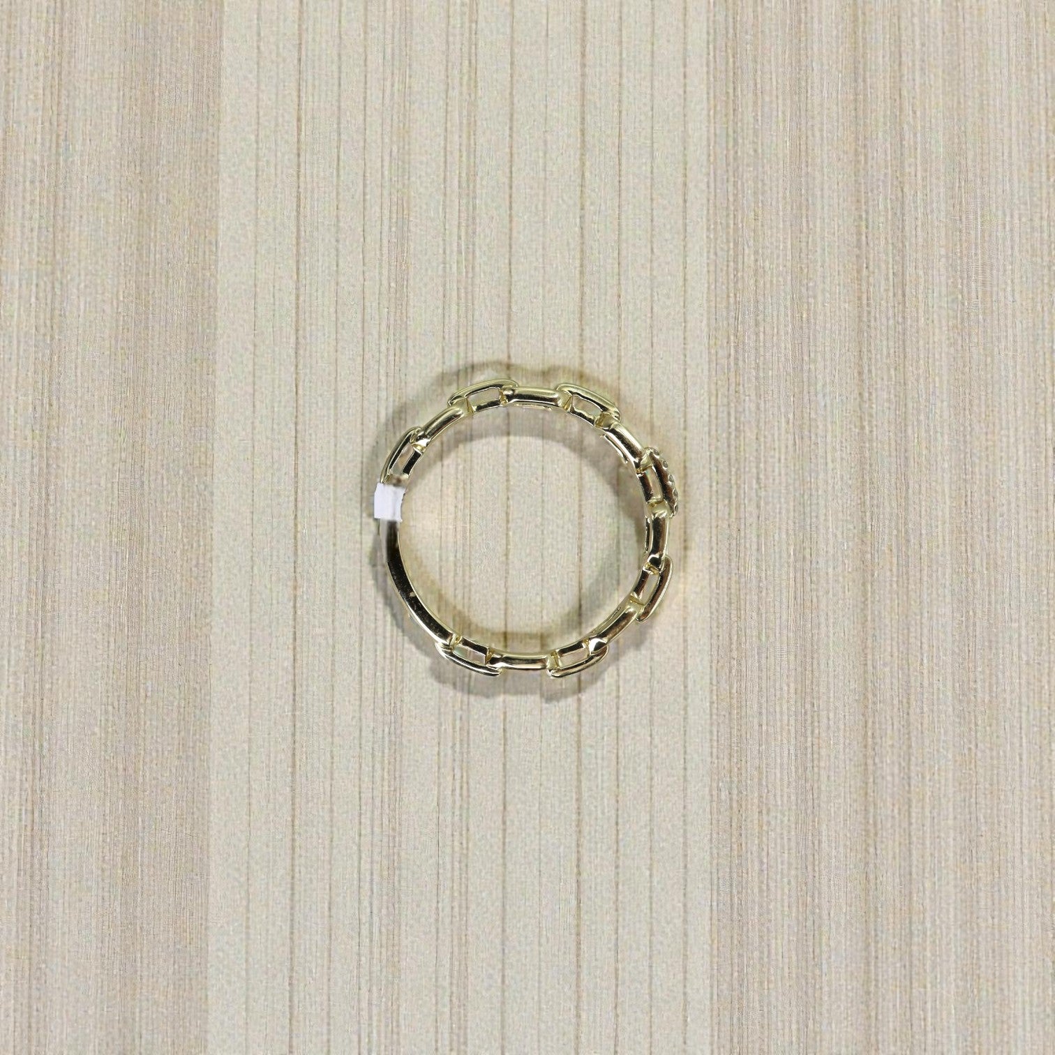 14k yellow gold diamond link band with 0.02ct diamonds, elegant jewelry by Dilamani, showcasing a close-up of the band design.