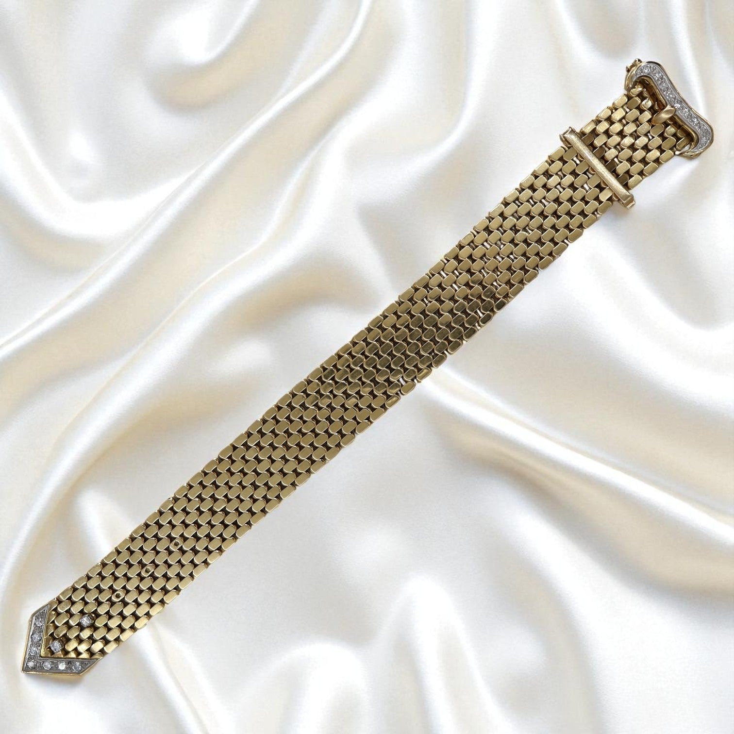 Retro 18k gold diamond buckle bracelet with vintage design, featuring sparkling diamonds and heirloom craftsmanship.