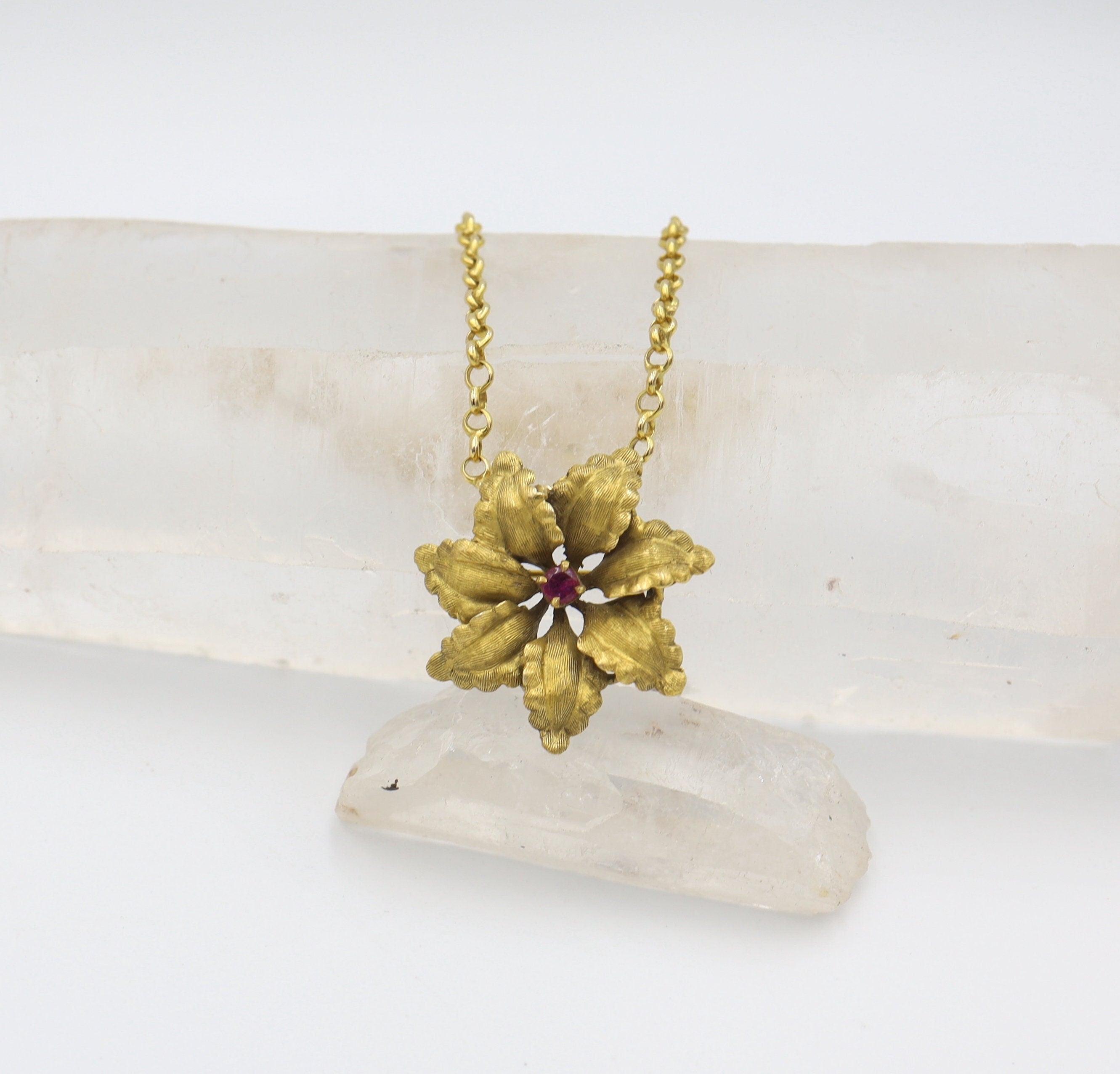 Art Nouveau Ruby Flower Pendant featuring a detailed ruby flower design, crafted by The Vintage Vault.