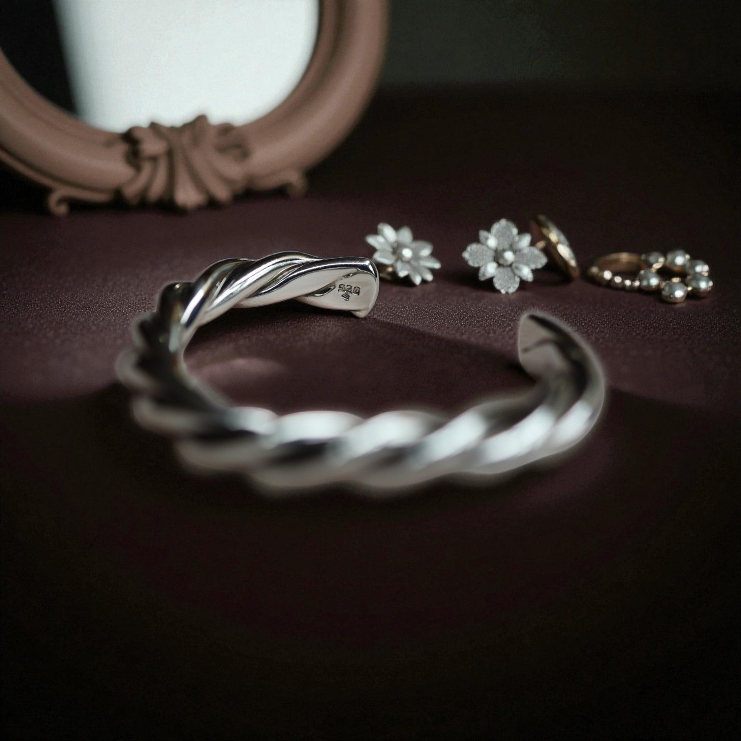 Vintage Sterling Silver Twisted Rope Cuff bracelet showcasing intricate twisted rope design and polished silver finish.