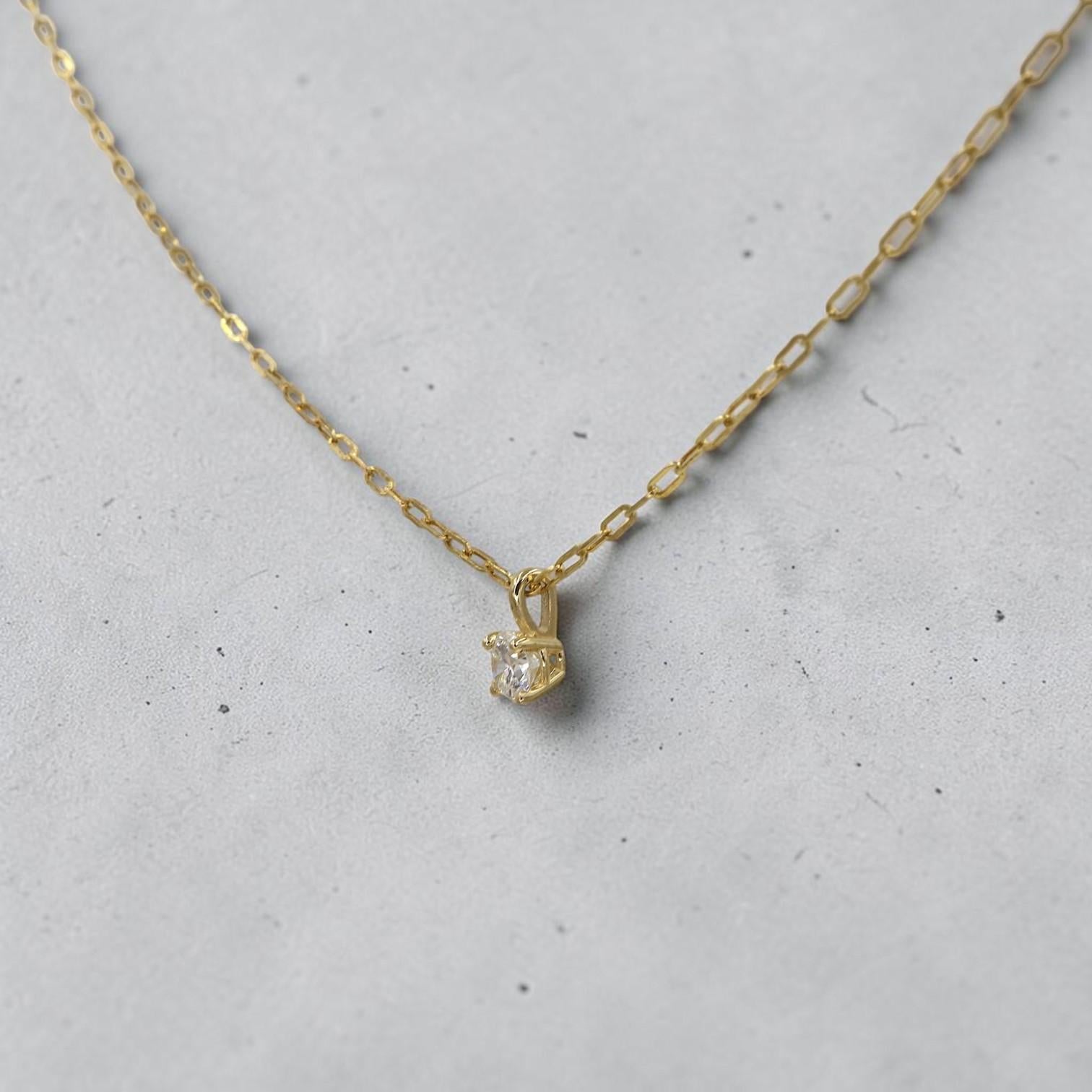 14k yellow gold solitaire diamond necklace with 0.29 ct K/VS2 diamond pendant and chain from Petra Star.