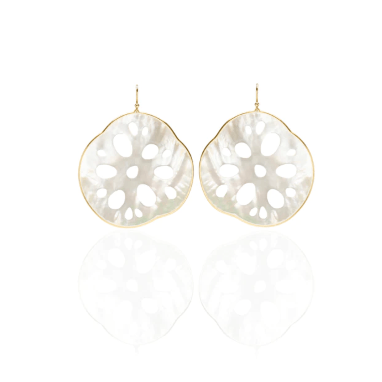 Small sand dollar earrings by Annette Ferdinandsen featuring delicate, lightweight jewelry with a beach-inspired design.