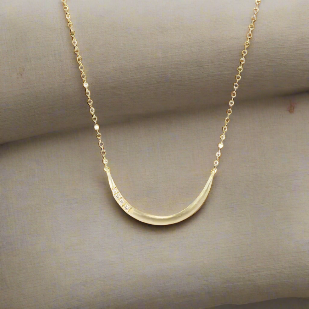 Dan-Yell Tugay Diamond Charm Holder Necklace featuring a delicate chain with a sparkling diamond charm.