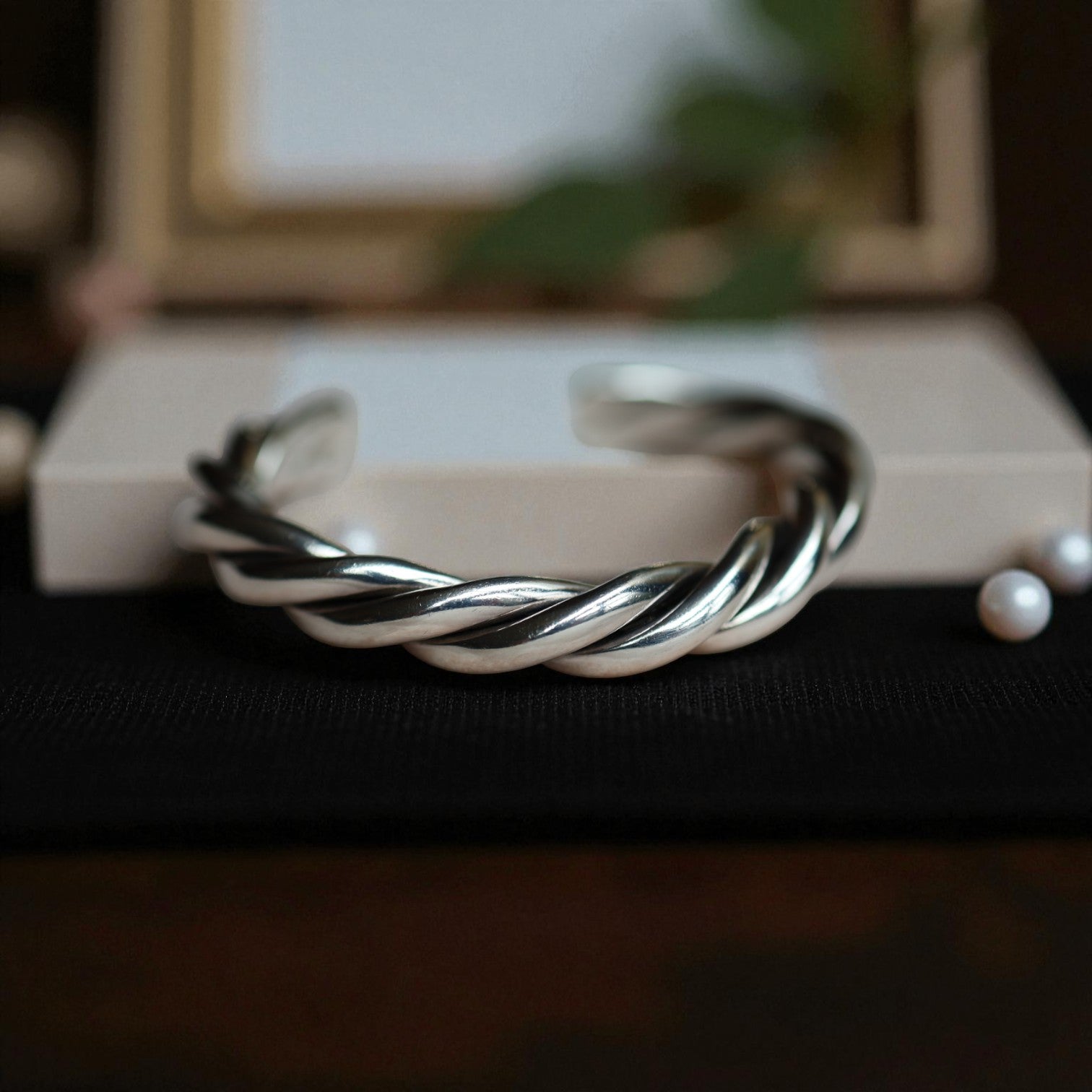 Vintage Sterling Silver Twisted Rope Cuff bracelet with textured design, showcasing intricate craftsmanship.