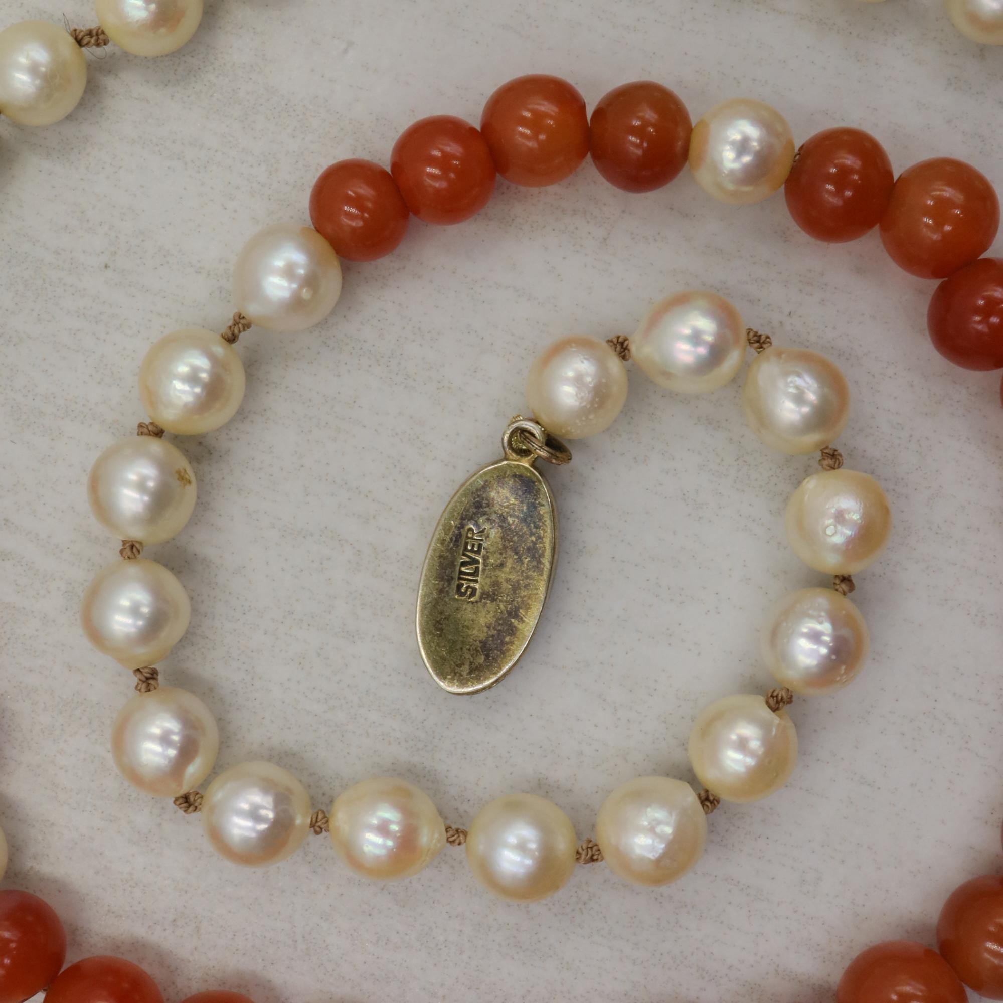 Vintage silver clasp necklace featuring carnelian and pearl beads, 21-inch length, from The Vintage Vault.