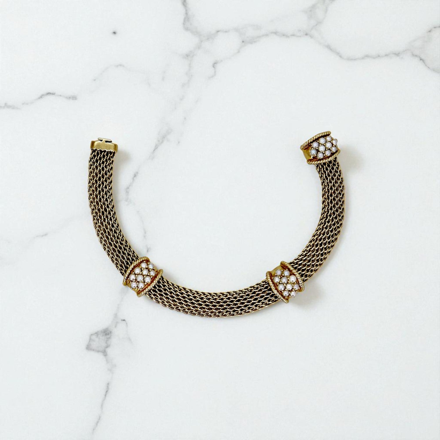 Vintage 14k gold mesh weave bracelet from The Vintage Vault showing its intricate design and polished finish.