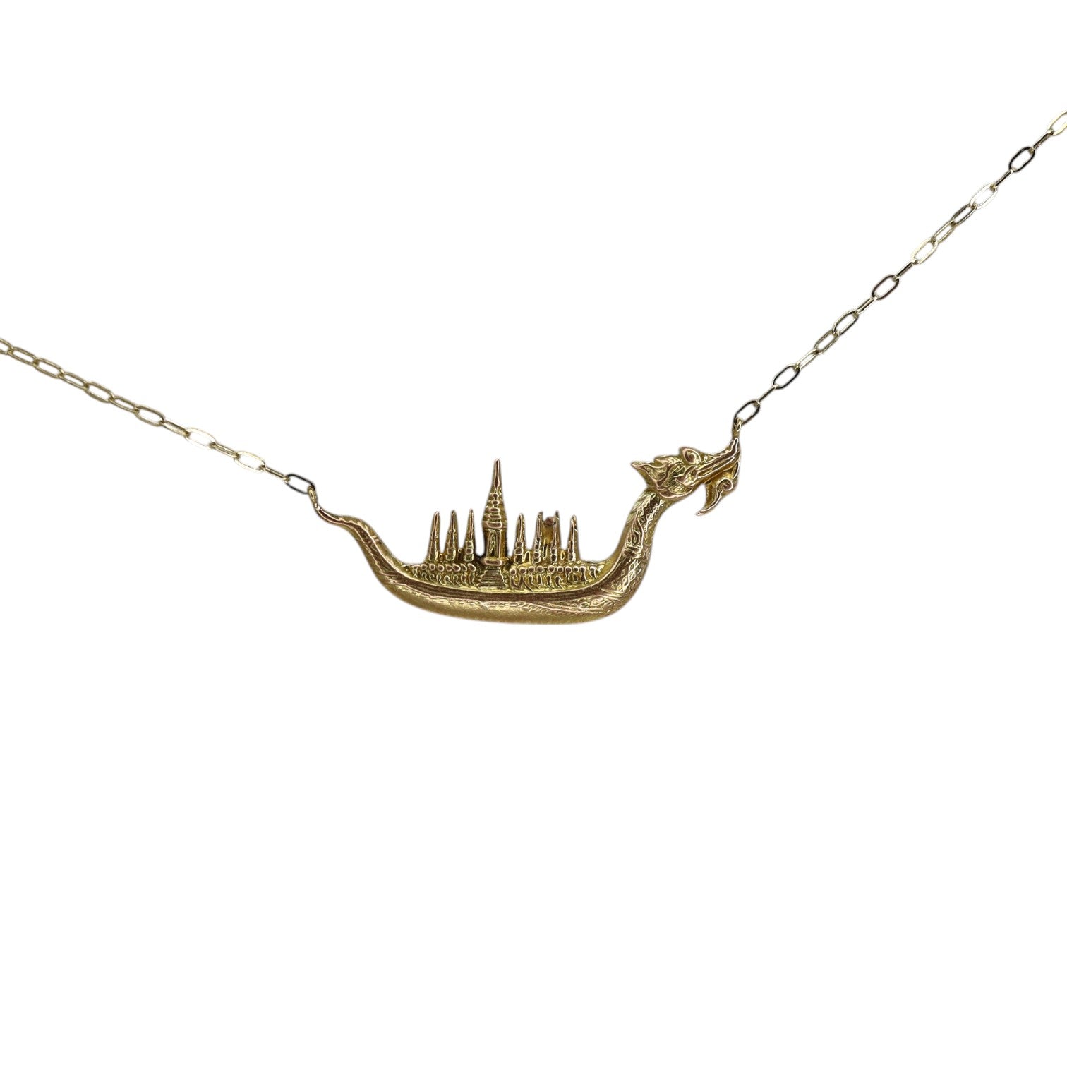 Vintage ship pendant necklace in solid 14k gold, crafted by The Vintage Vault, featuring intricate nautical design.