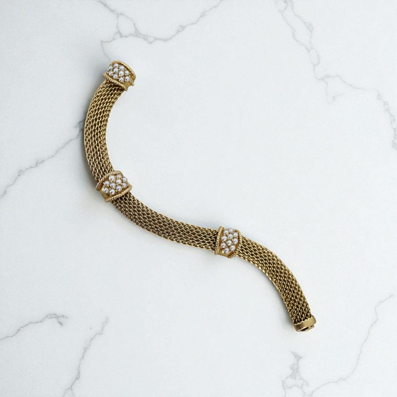 Vintage 14k mesh weave bracelet with pearl accents from The Vintage Vault, showcasing intricate jewelry craftsmanship.