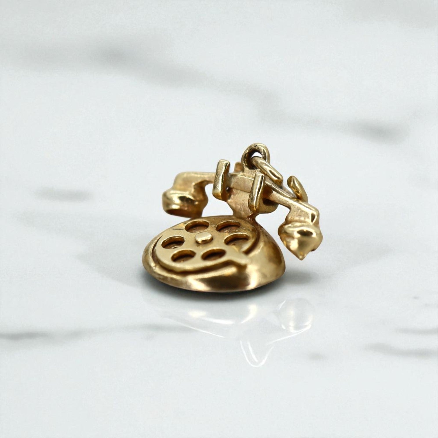 14k gold "I Love You" rotary telephone charm, vintage-style jewelry piece from The Vintage Vault with intricate detailing.