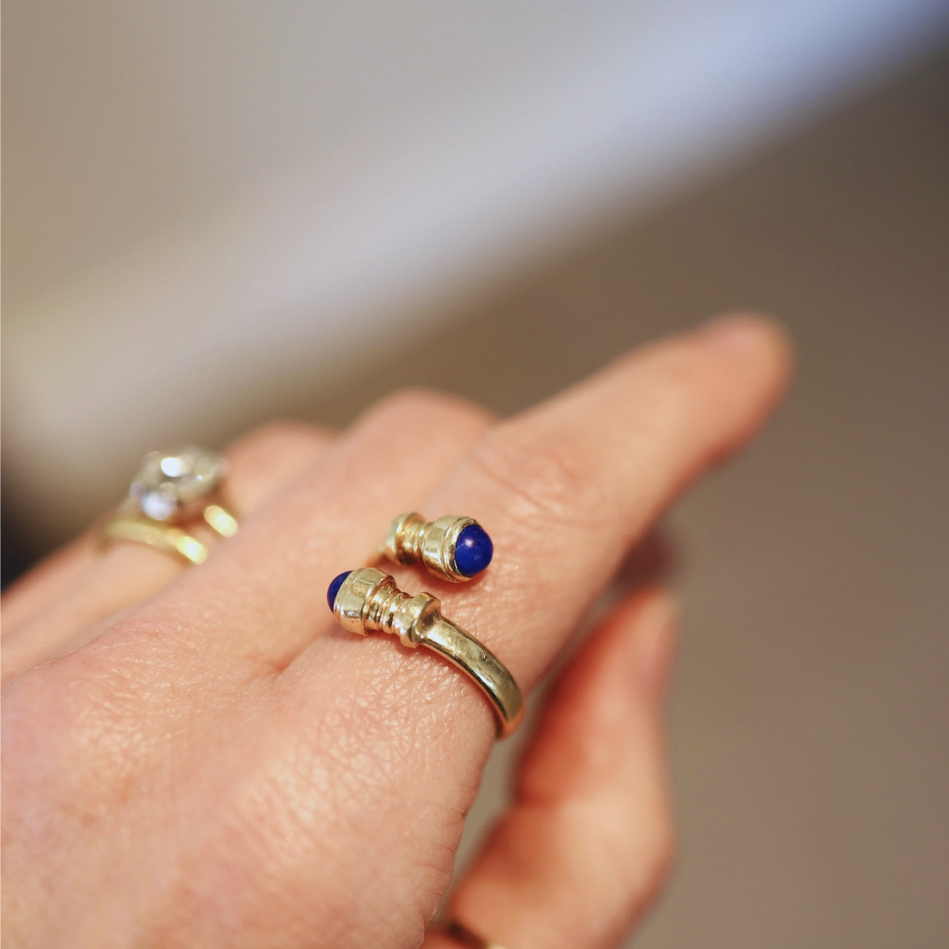 Vintage lapis bypass ring in 14k yellow gold featuring a bold lapis stone and elegant design from The Vintage Vault.