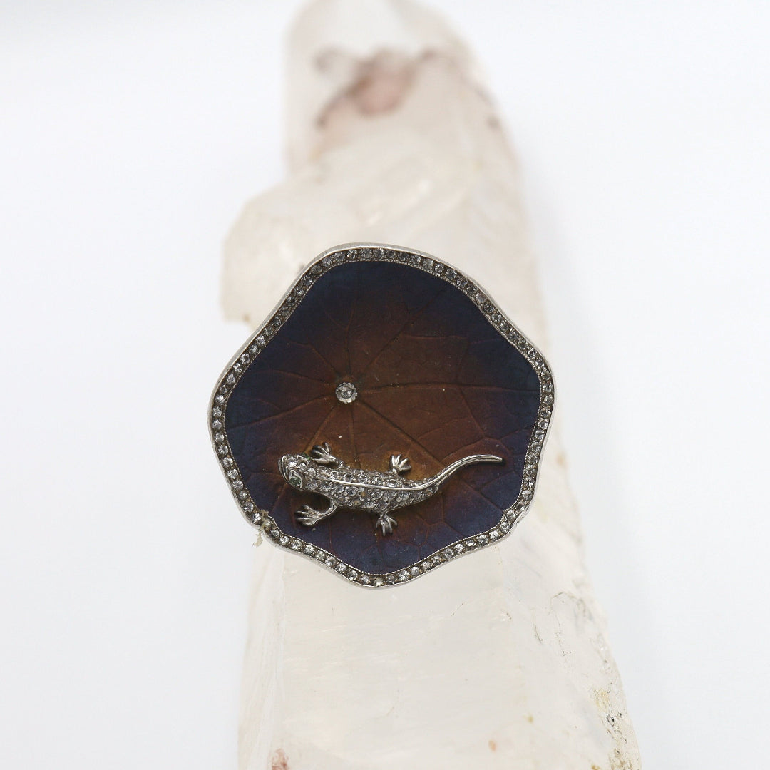 White sapphire lizard ring by PS featuring a detailed lizard design on a sleek band.