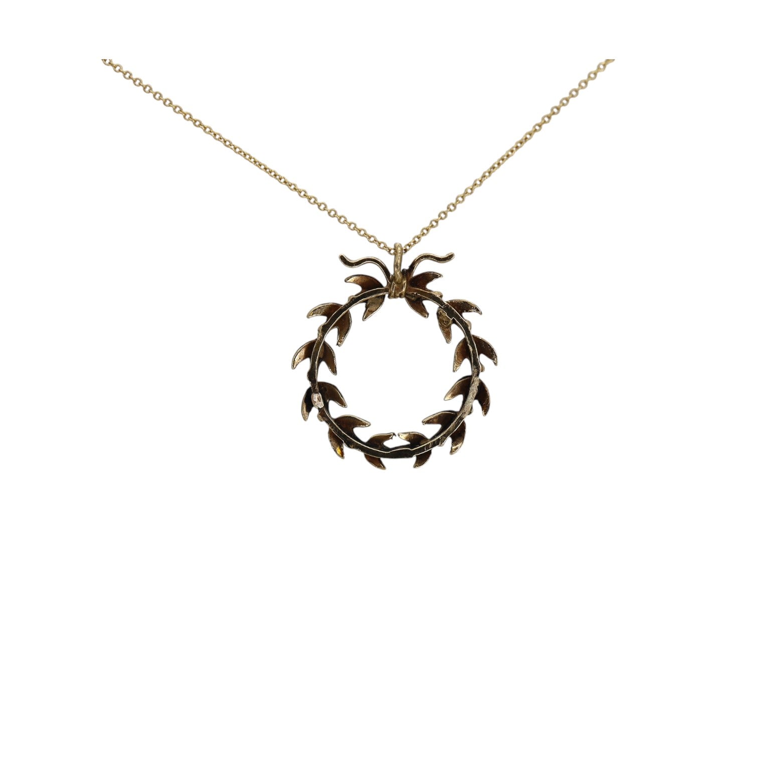 Victorian pearl wreath pendant featuring intricate design, suspended from a delicate chain, crafted by The Vintage Vault.