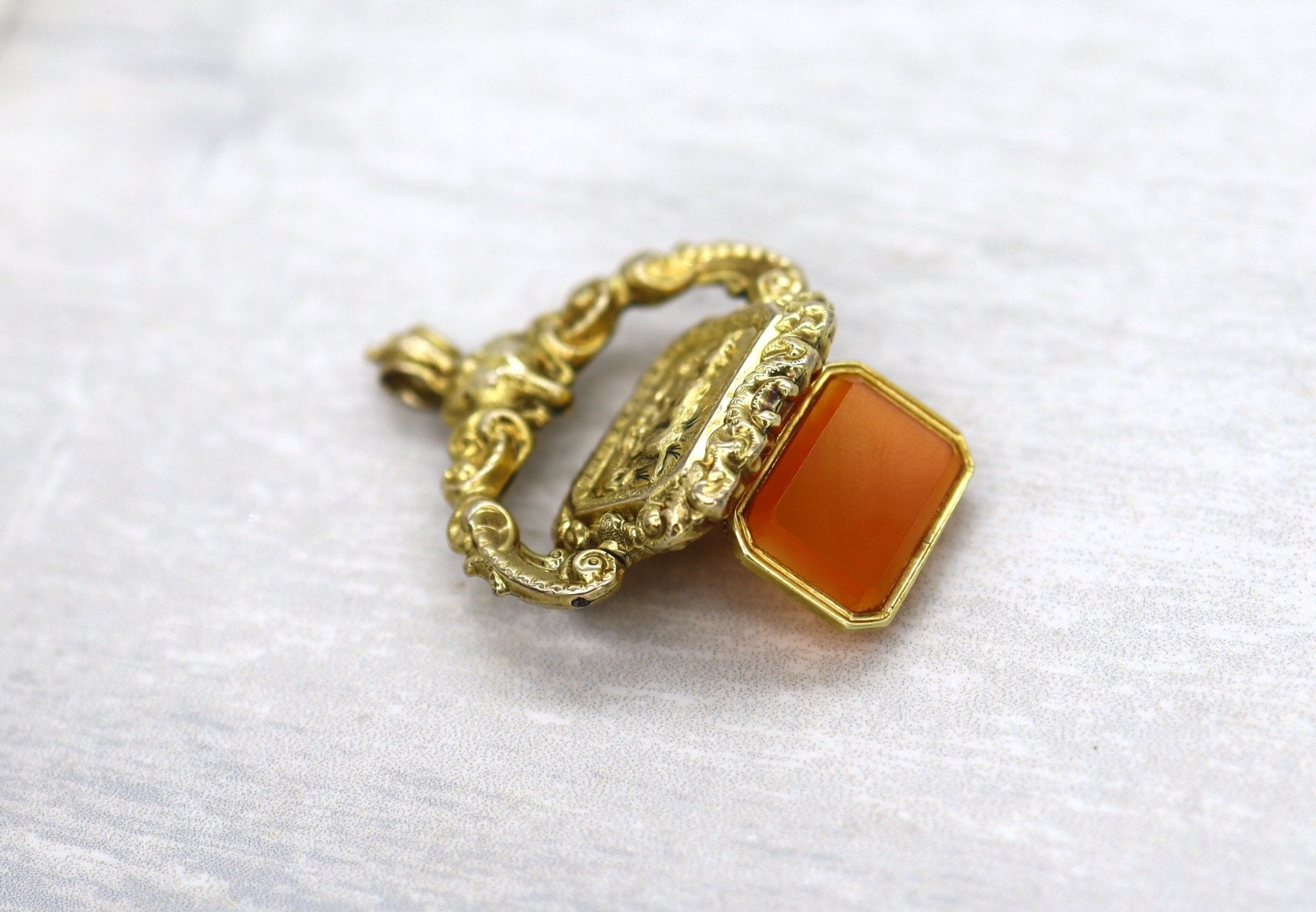 Antique Carnelian Locket Fob with Intricate Repoussé Hunting Dog Design - Petra Star