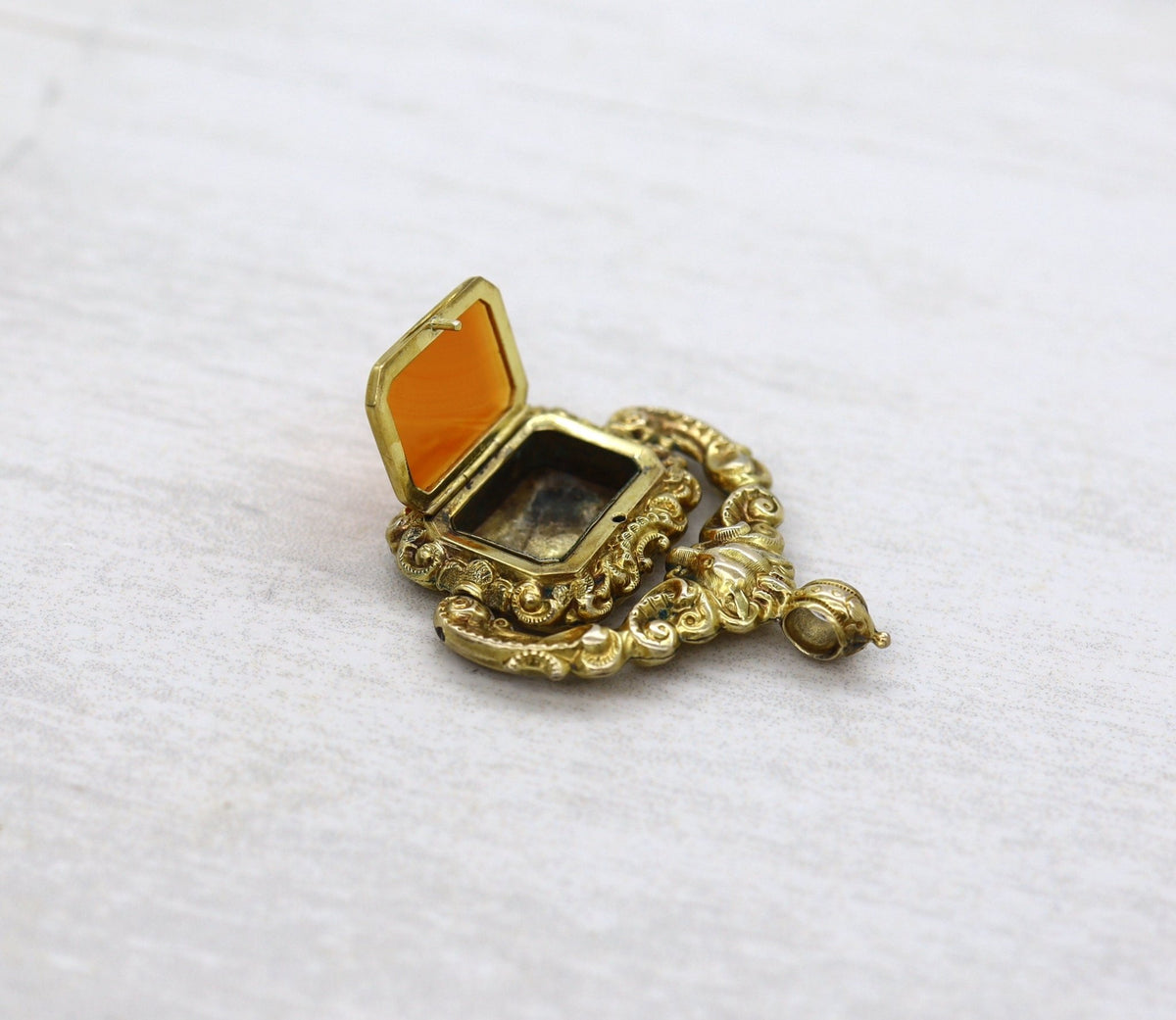 Antique Carnelian Locket Fob with Intricate Repoussé Hunting Dog Design - Petra Star