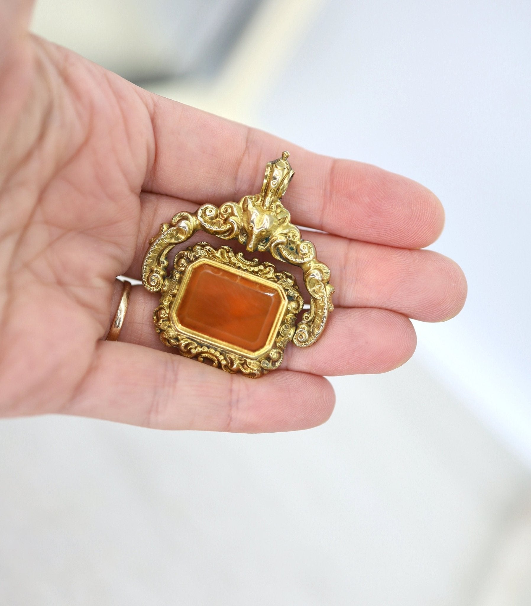 Antique Carnelian Locket Fob with Intricate Repoussé Hunting Dog Design - Petra Star