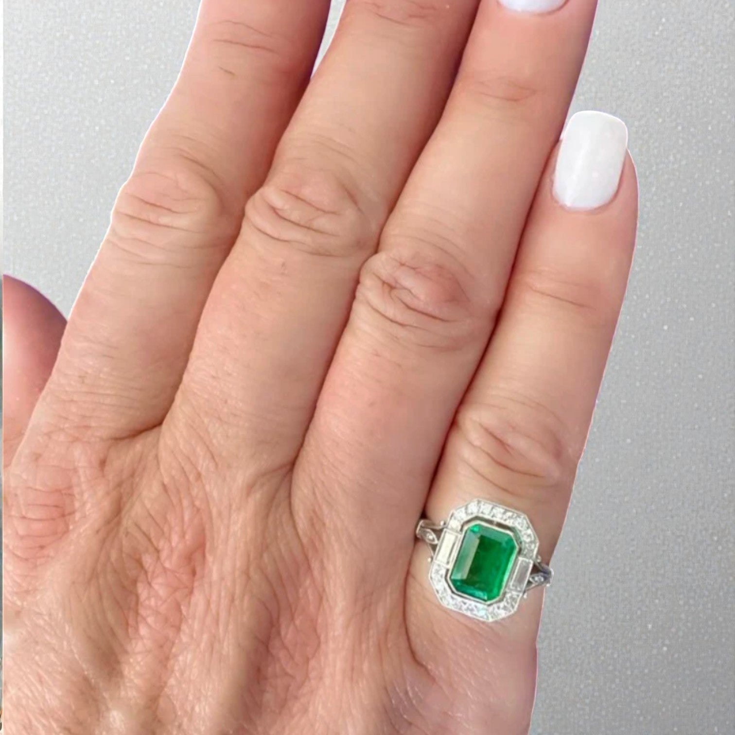 Emerald & Diamond Halo Ring in Platinum - Petra Star