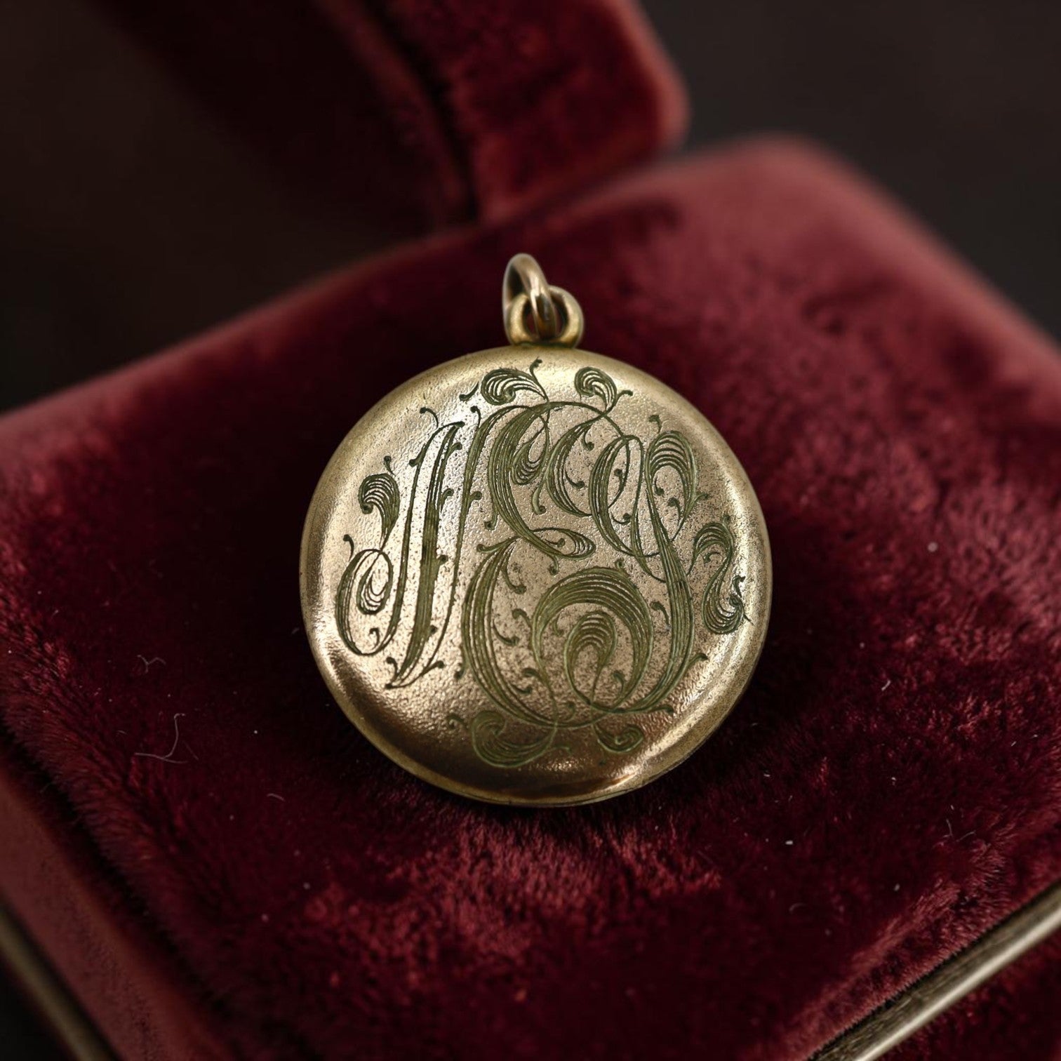 Art Nouveau gold-filled lion pendant locket with paste stones, engraved monogram, circa 1905, vintage jewelry from The Vintage Vault.