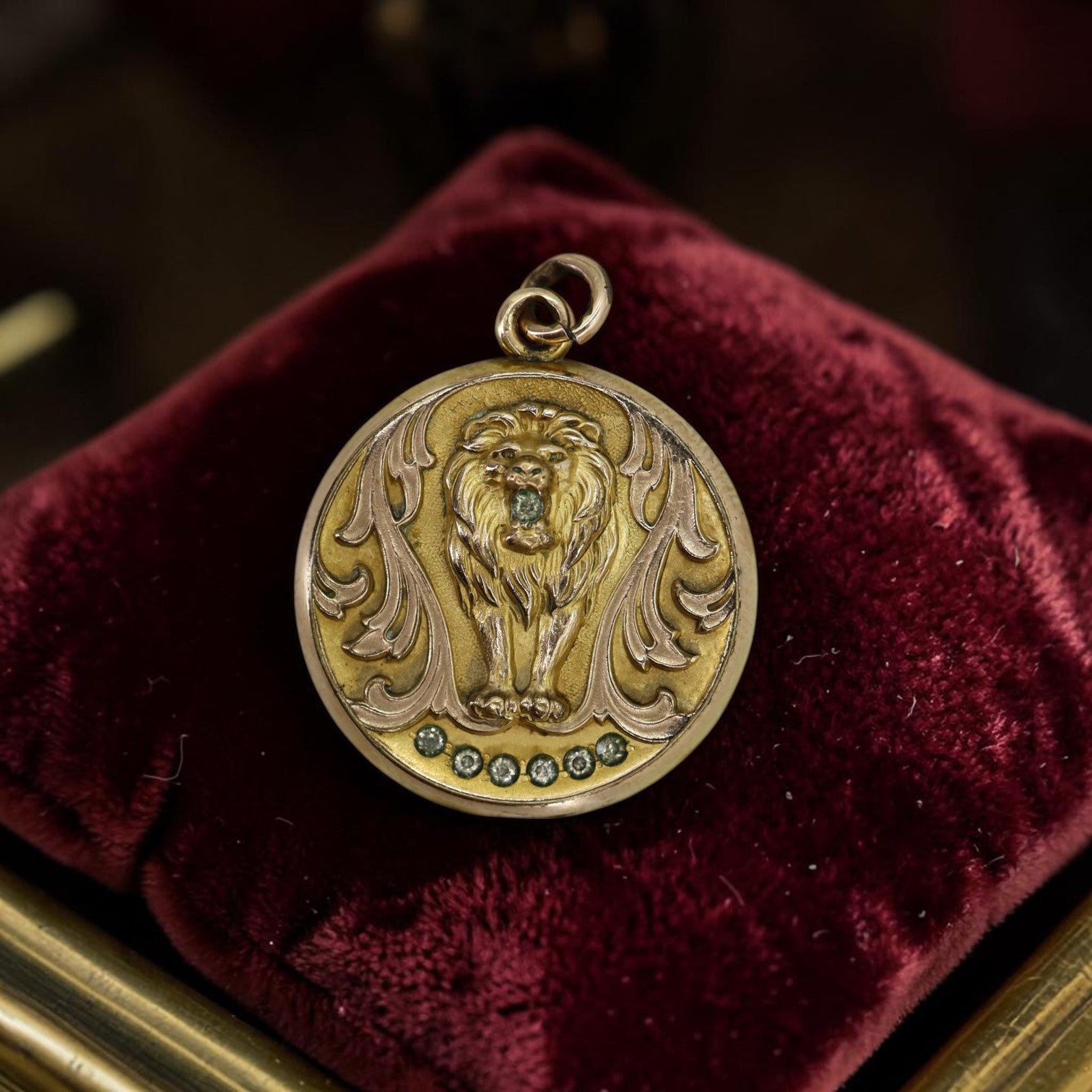 Vintage Art Nouveau gold-filled lion pendant locket with paste stones, circa 1905, monogrammed NES.
