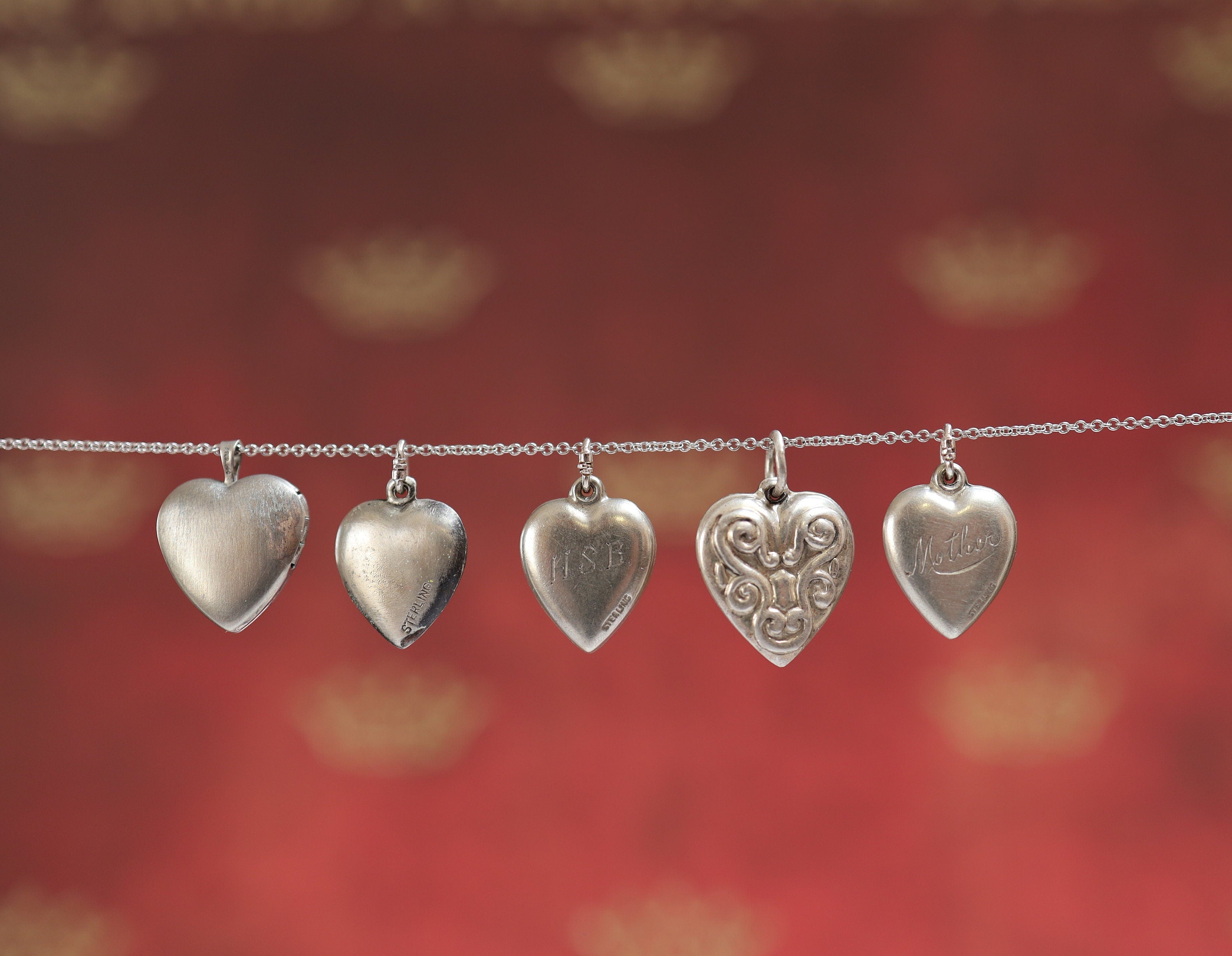 Art Nouveau silver puffy heart pendant locket with intricate design, featuring a vintage style from The Vintage Vault.
