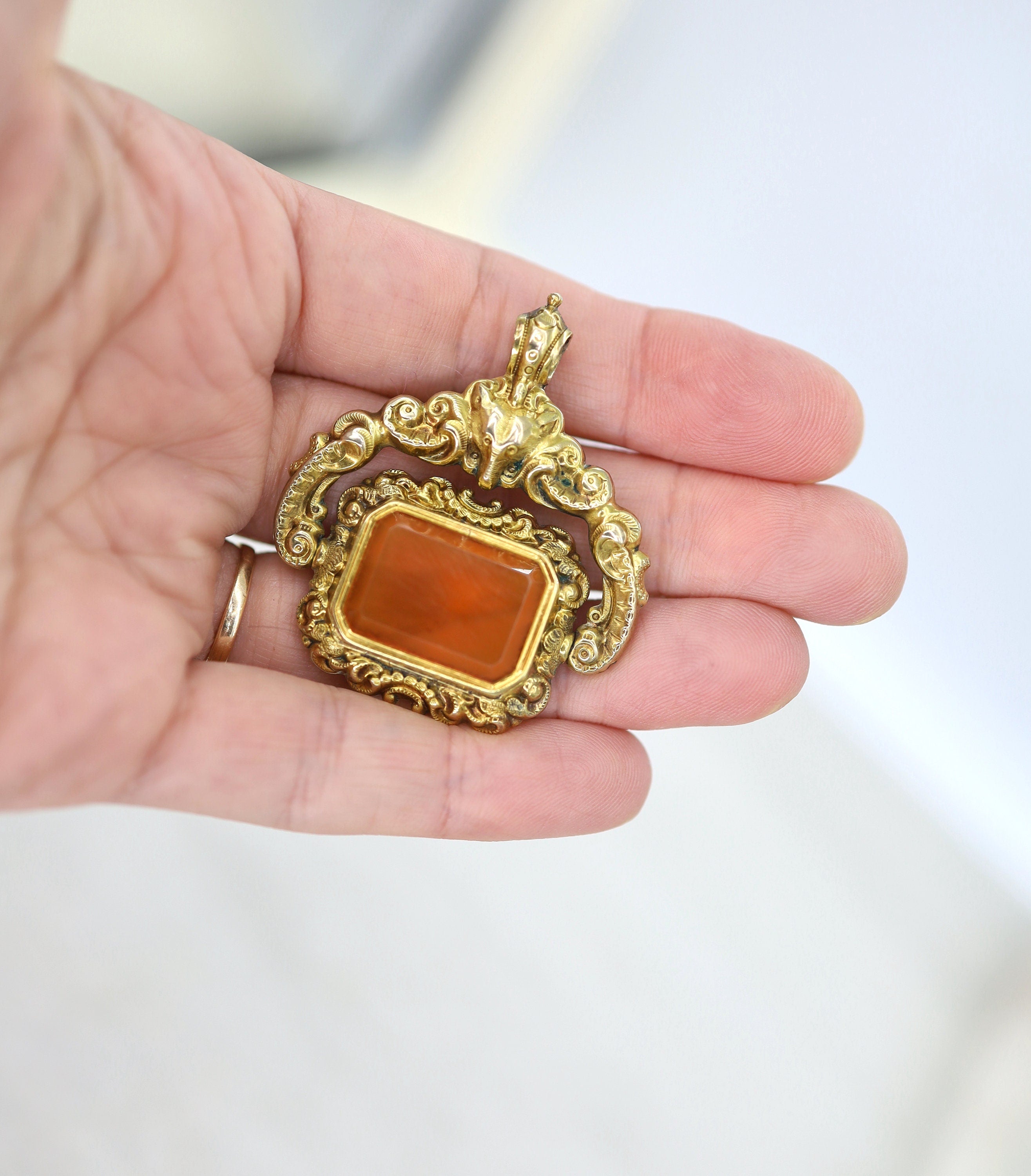 Antique Carnelian Locket Fob with Intricate Repoussé Hunting Dog Design - Petra Star