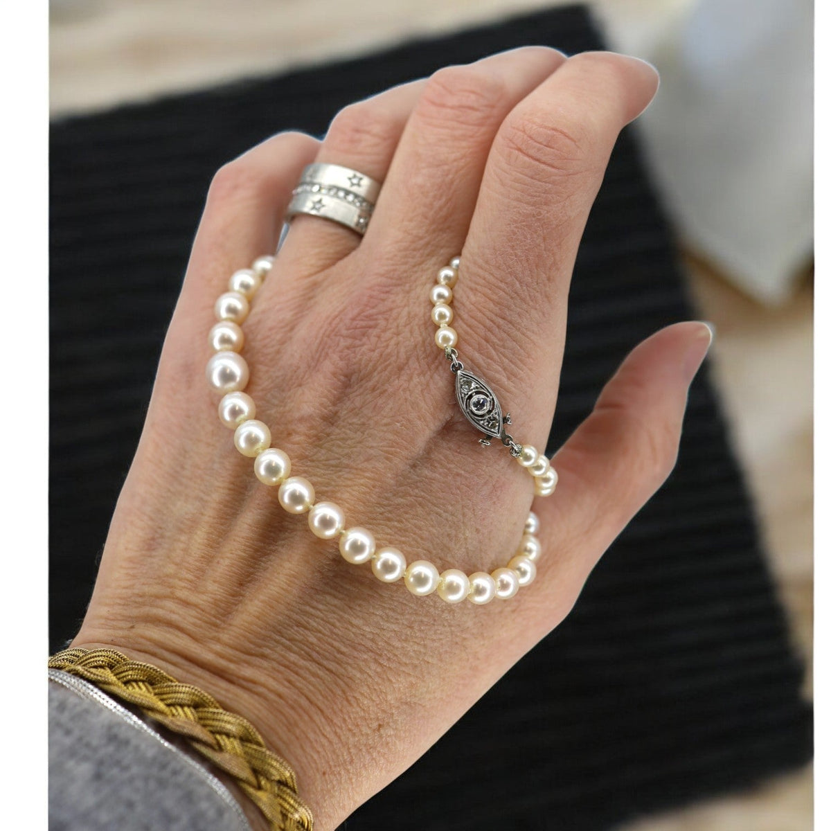 Platinum and Diamond Graduated Pearl Necklace - Petra Star