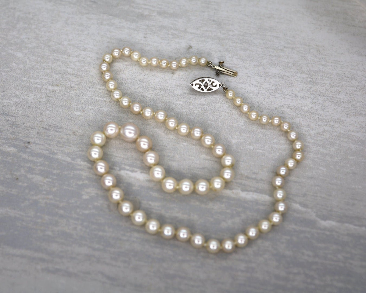 Platinum and Diamond Graduated Pearl Necklace - Petra Star