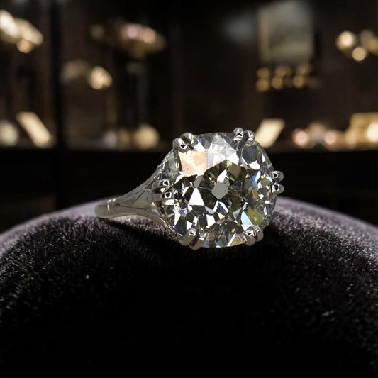 Petra Star Vintage Vault Collection | c. 1905 Edwardian Platinum Solitaire Ring | 7.57ct Old Mine Cut Diamond - Petra Star