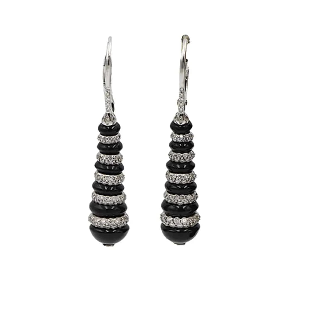 Onyx and diamond black and white earrings featuring vintage design with polished stones and elegant craftsmanship.