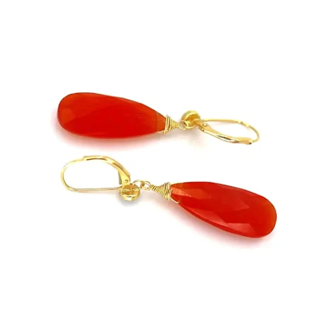 Petra Star Firestarter Earrings featuring fiery, flame-inspired design with gold-tone accents and dangling earring style.