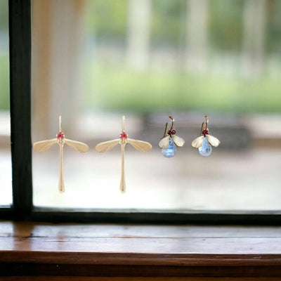 14K gold Damsel Dragonfly earrings by Annette Ferdinandsen featuring ruby accents, detailed insect design, and elegant craftsmanship.