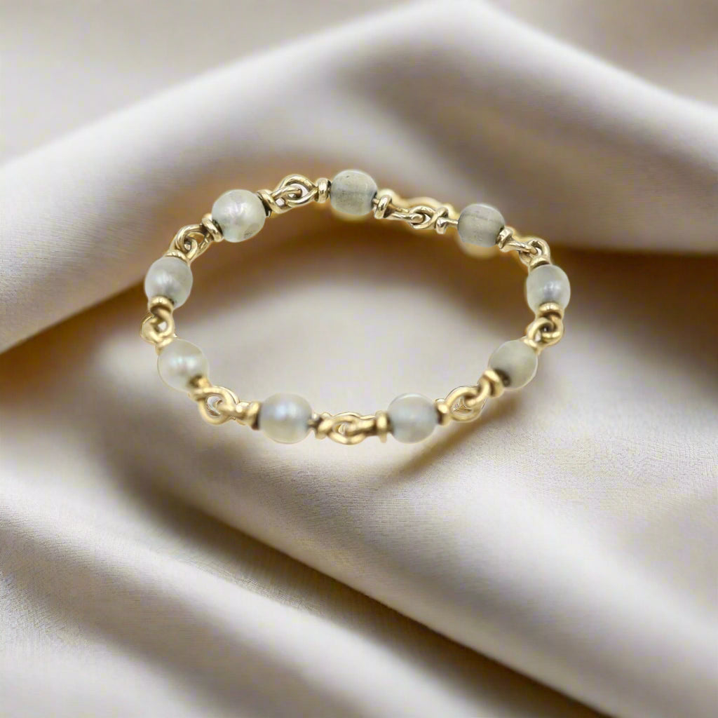 Antique 14k yellow gold vintage pearl chain ring with intricate design, showcasing elegant craftsmanship from The Vintage Vault.