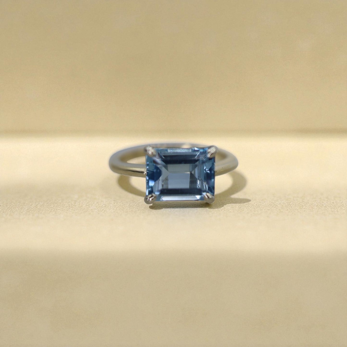 Aquamarine Emerald-Cut Solitaire in 14k Gold East-to-West Setting