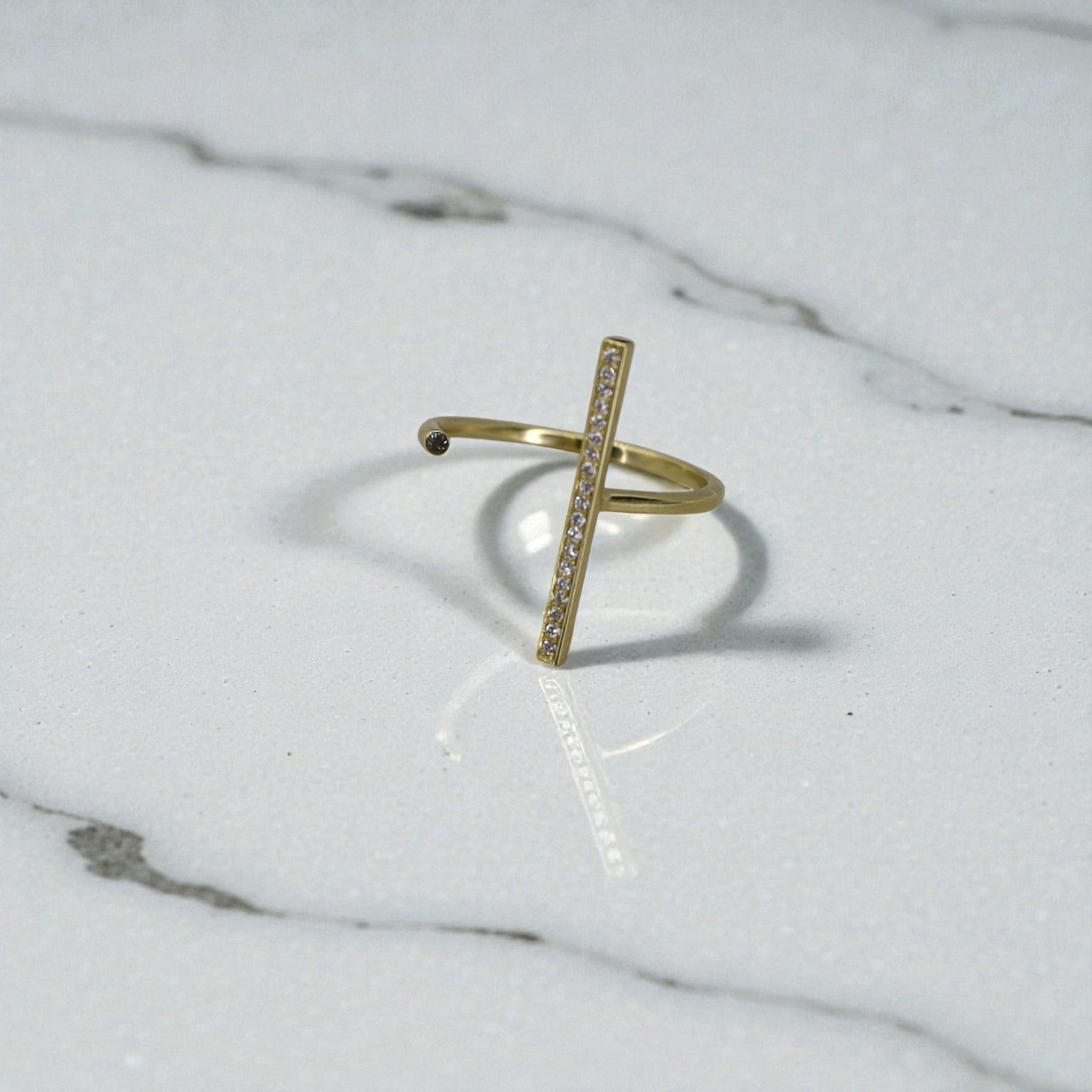 Shiva 18k gold open space line diamond ring with asymmetrical design and sparkling diamonds on a sleek gold band.