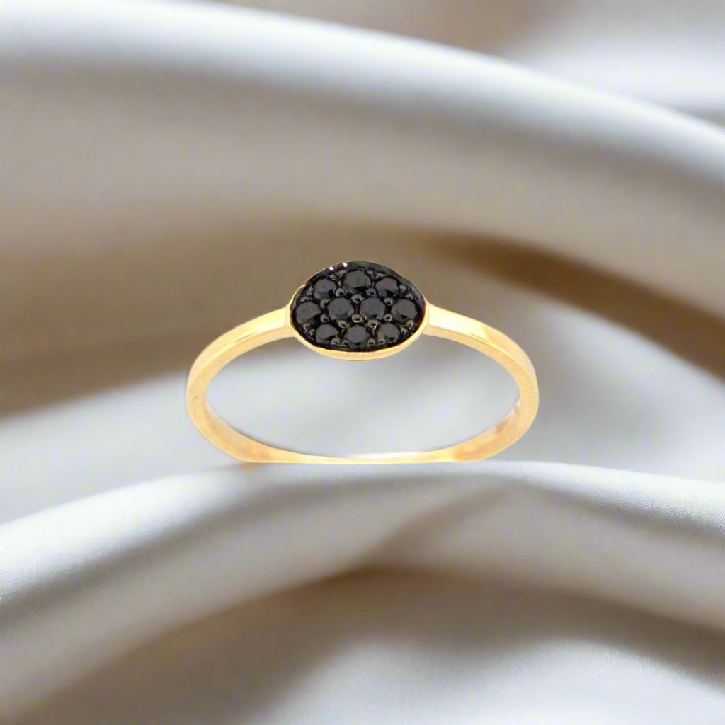 14k yellow gold Black Diamond ring by Dilamani, featuring a sleek design with a prominent black diamond centerpiece.